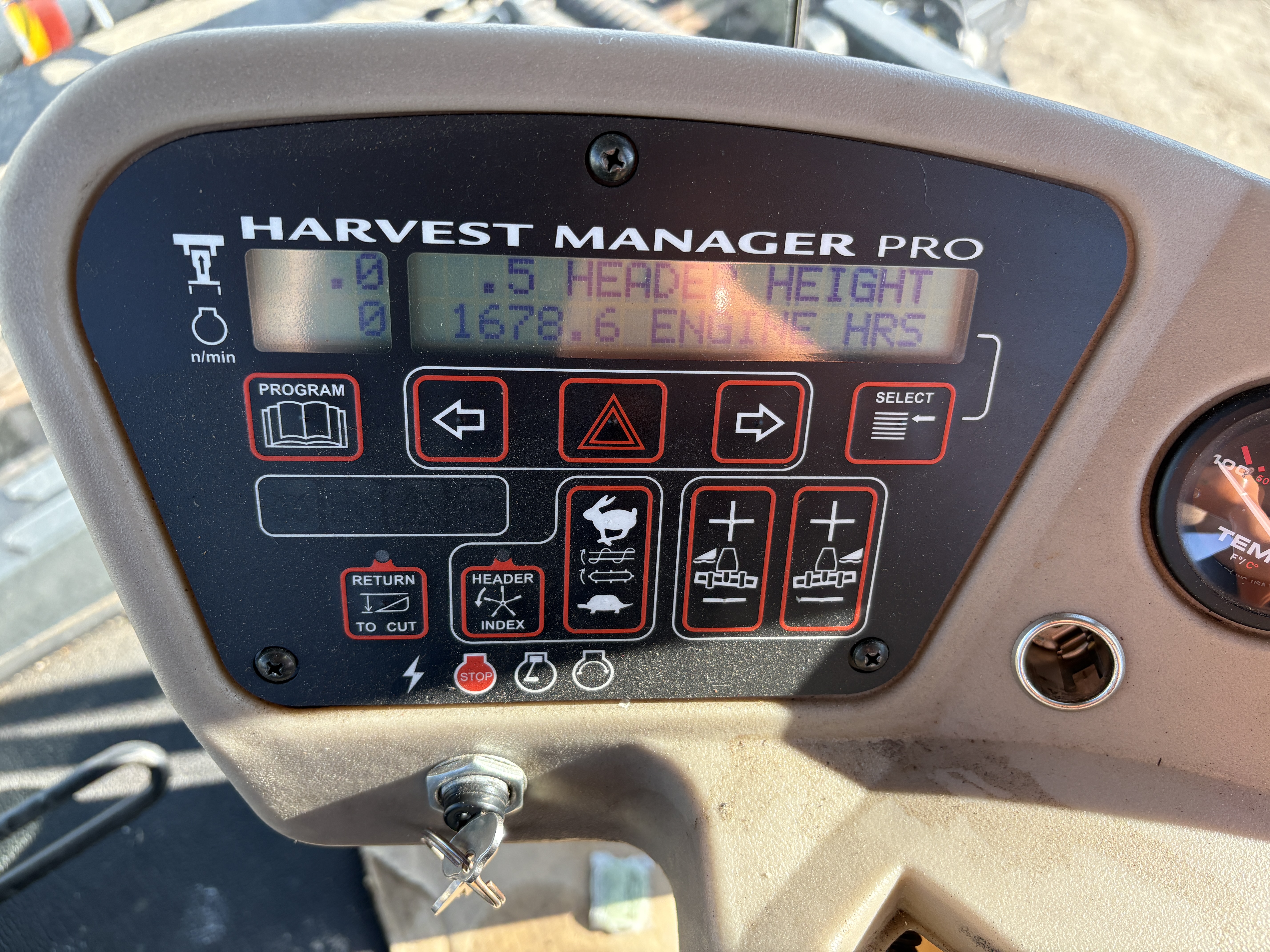 2009 MacDon M150 Windrower