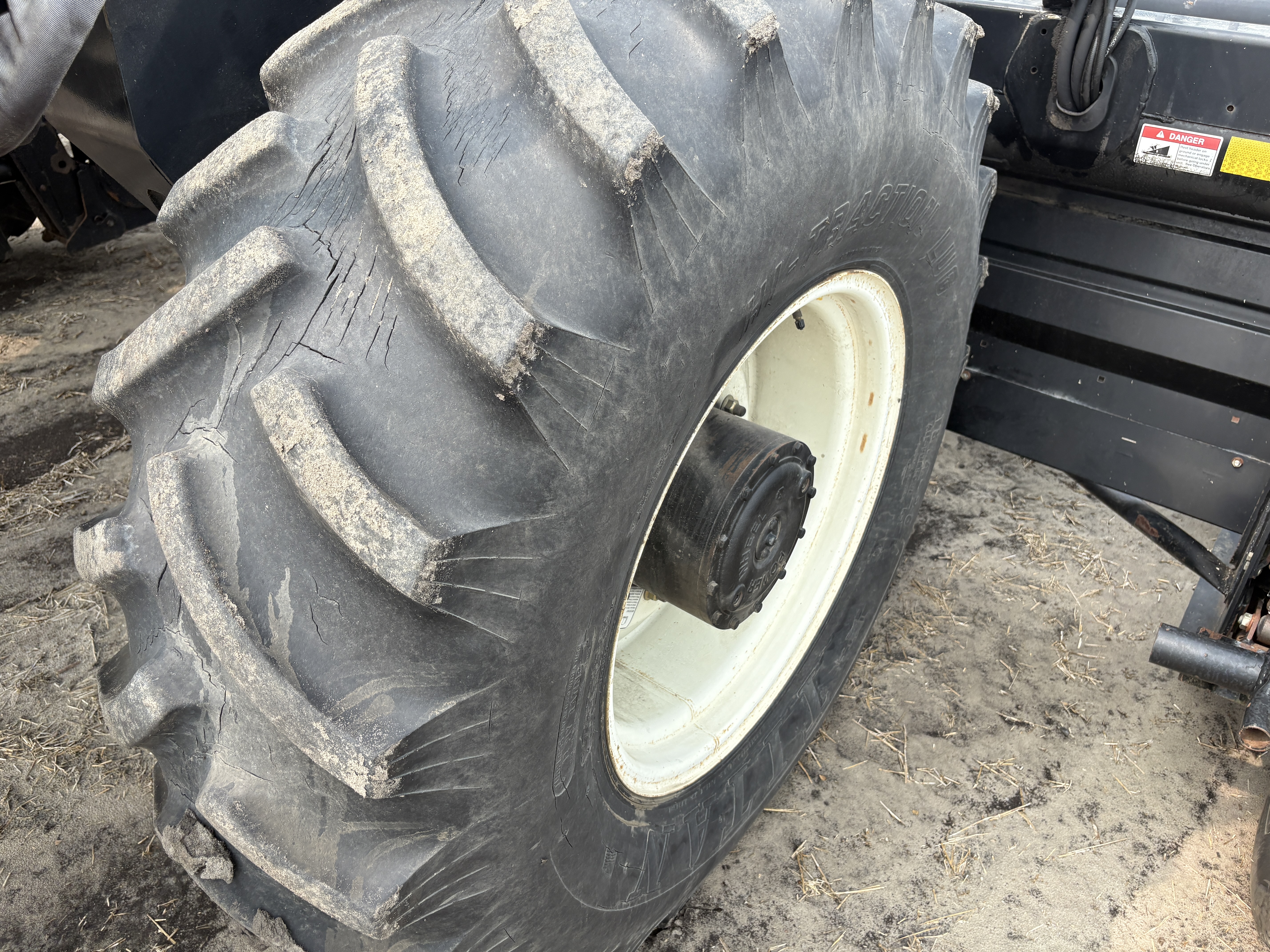 2009 MacDon M150 Windrower