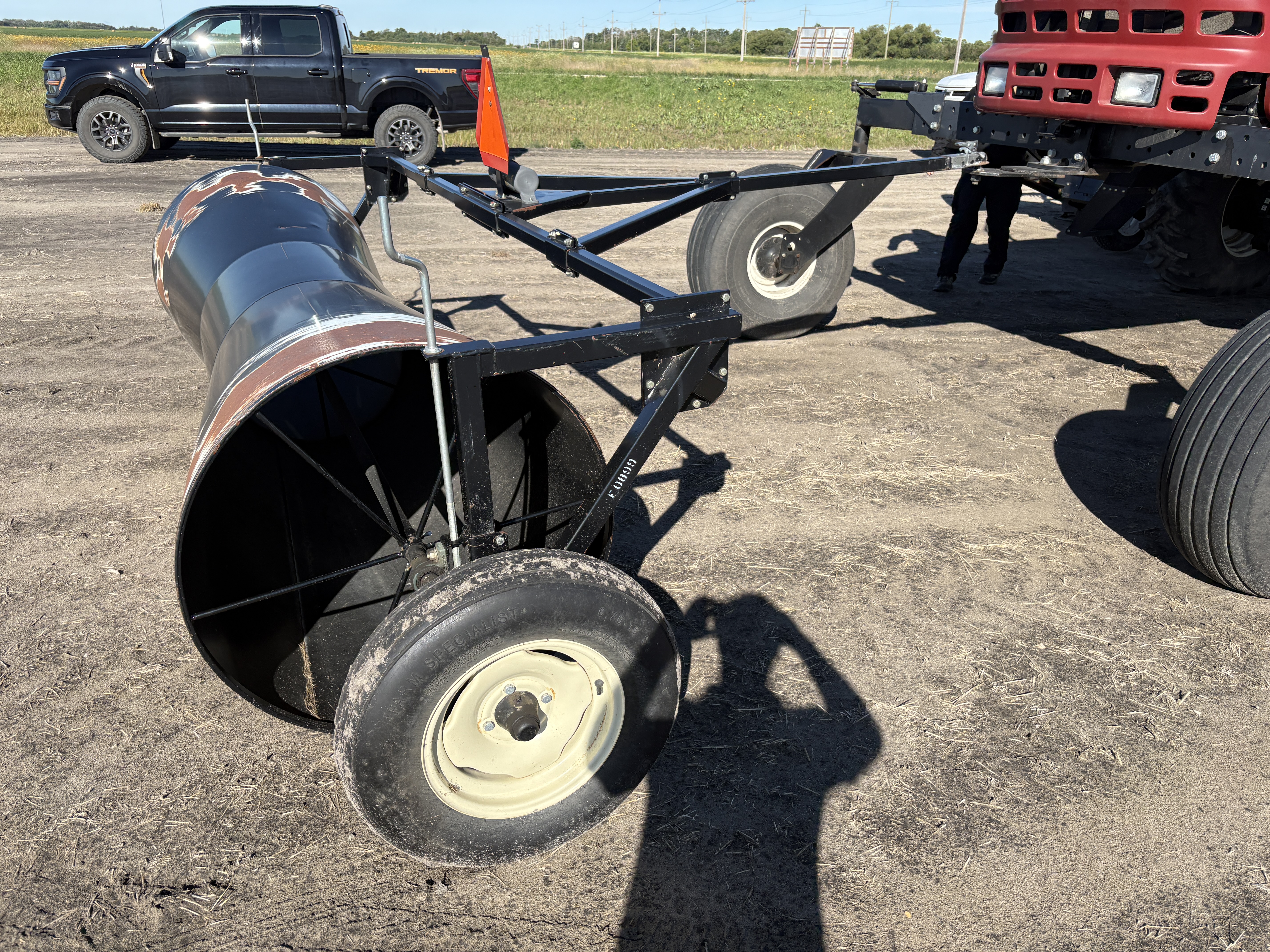 2009 MacDon M150 Windrower