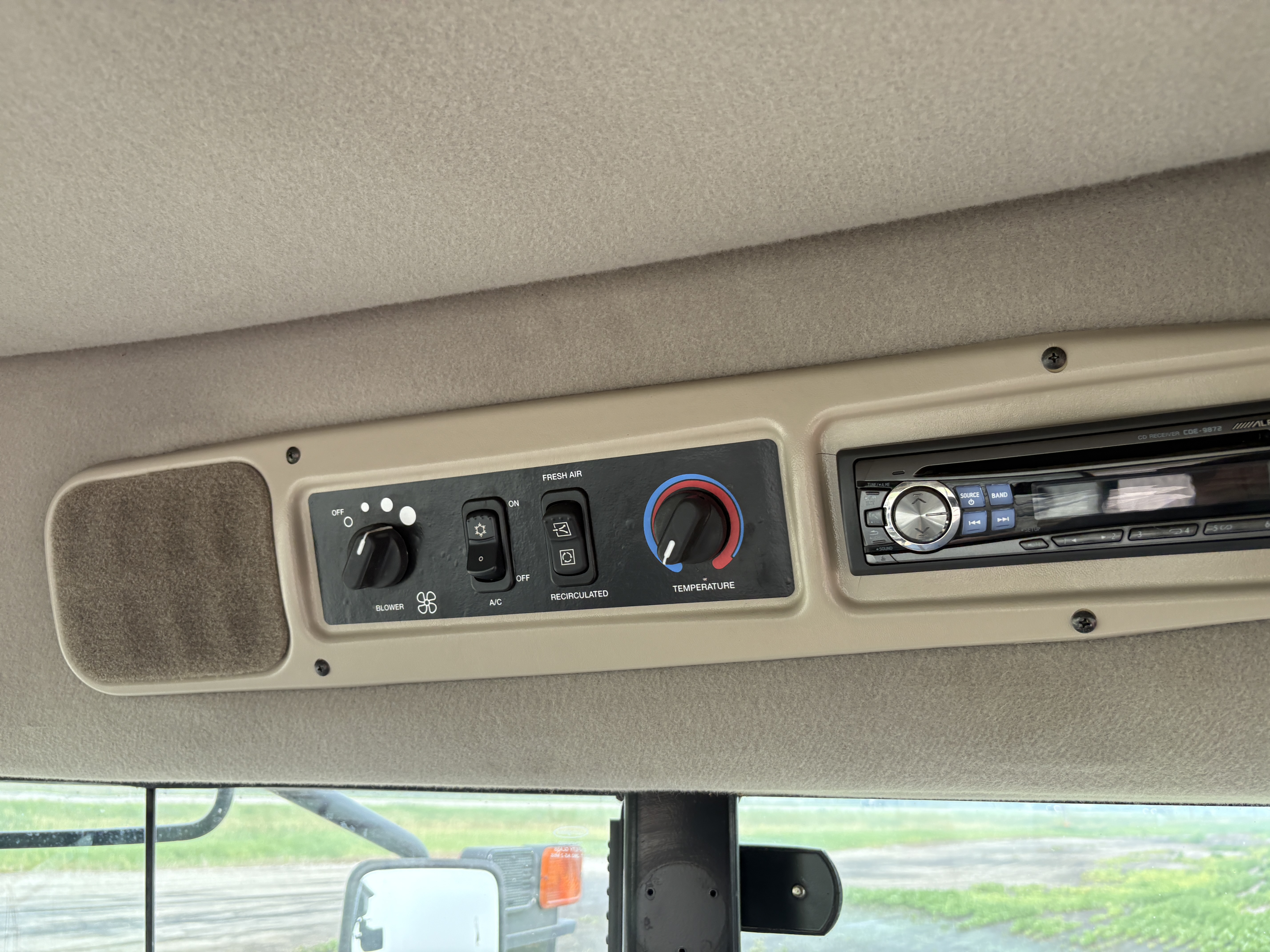 2009 MacDon M150 Windrower