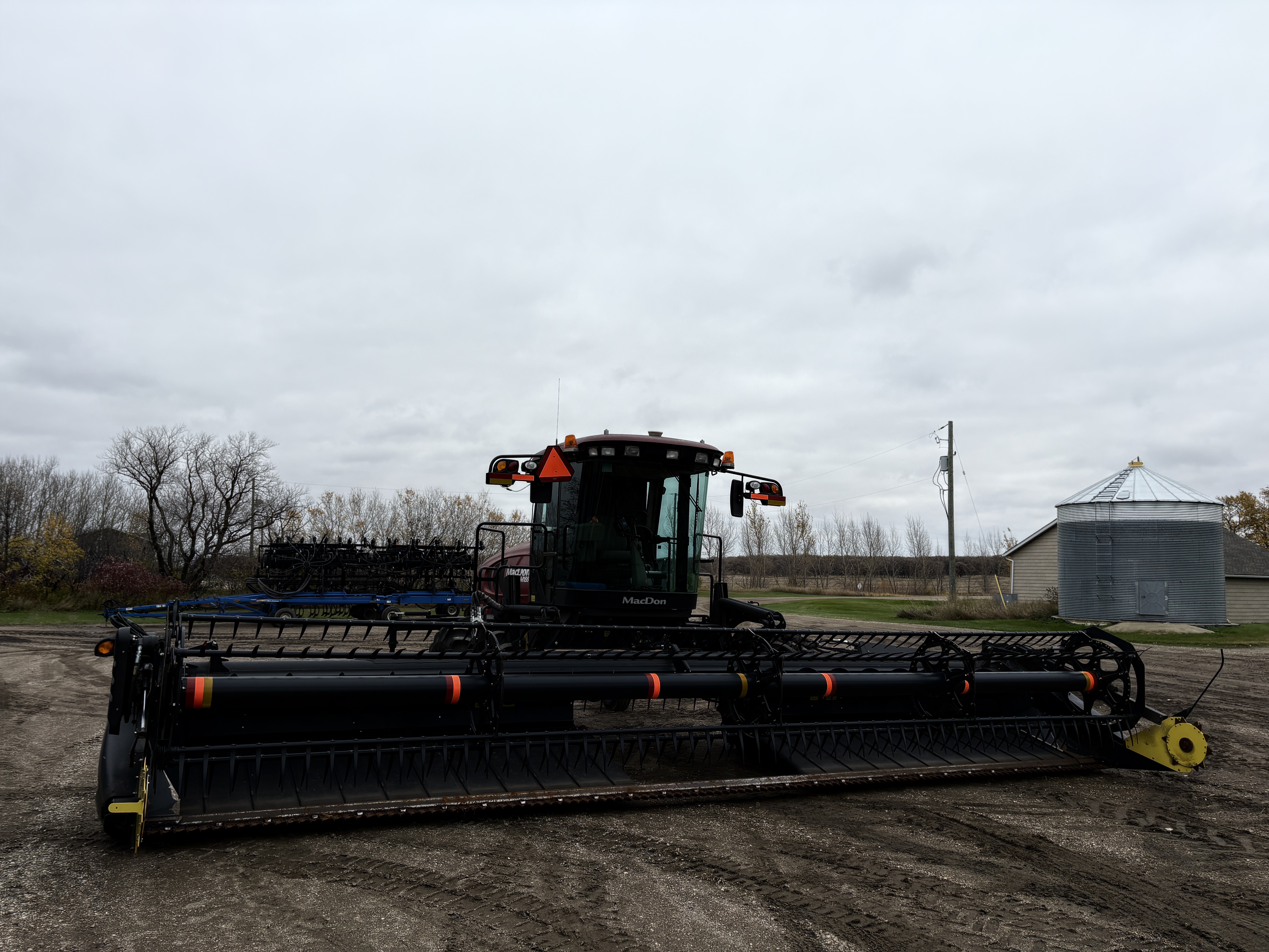 2014 MacDon M155 Windrower