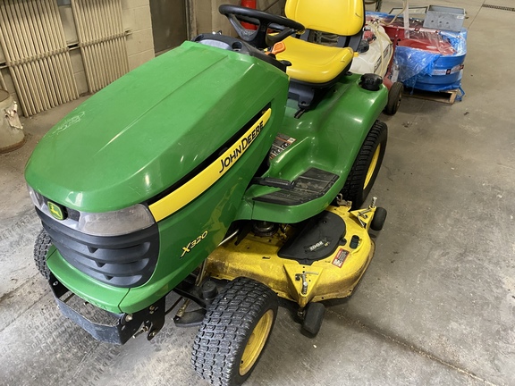 X320 mower outlet deck