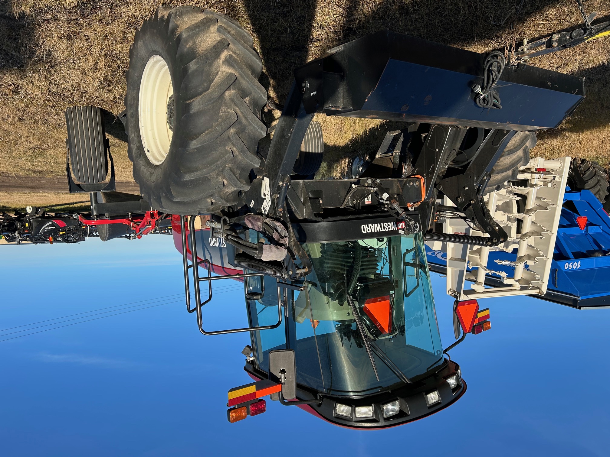 2011 MacDon M150 Windrower
