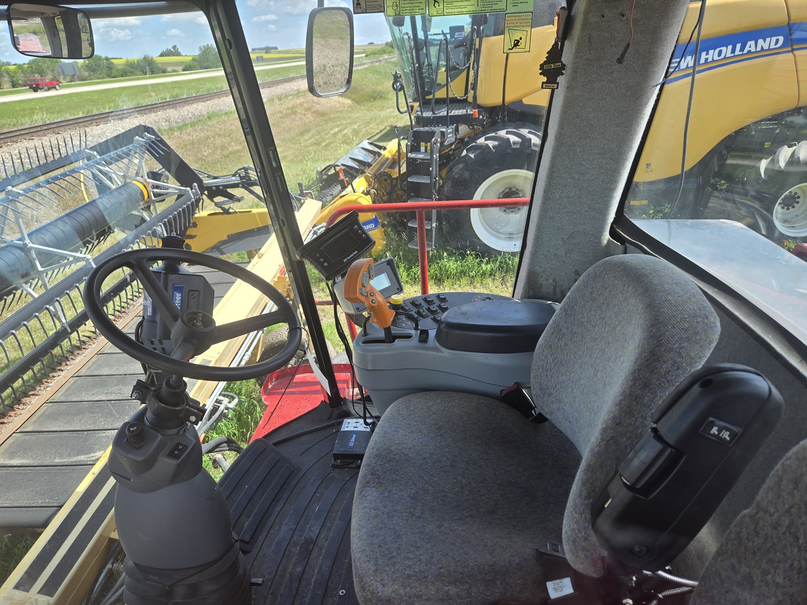 2012 New Holland H8060 Windrower