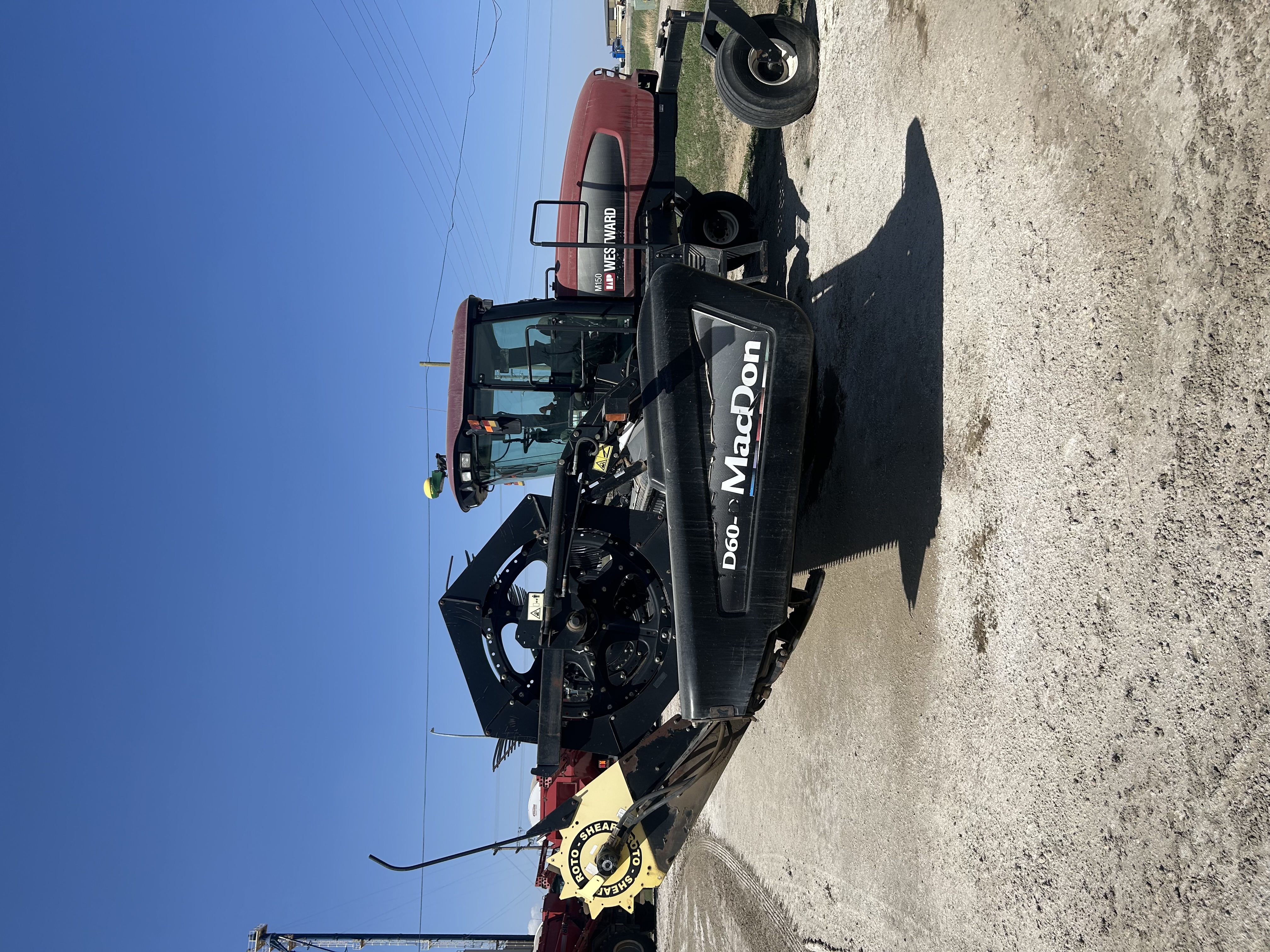 2010 MacDon M150 Windrower