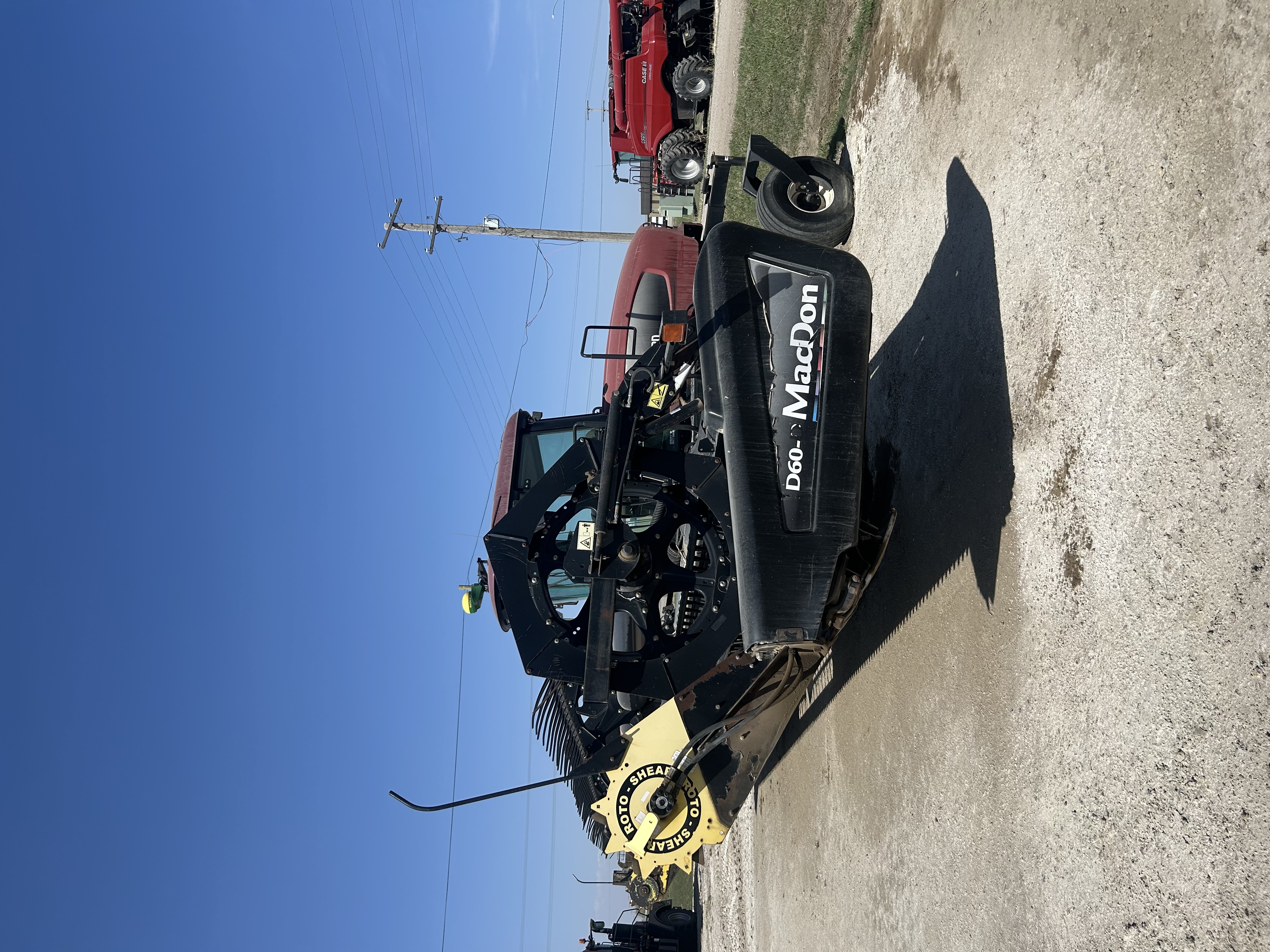 2010 MacDon M150 Windrower