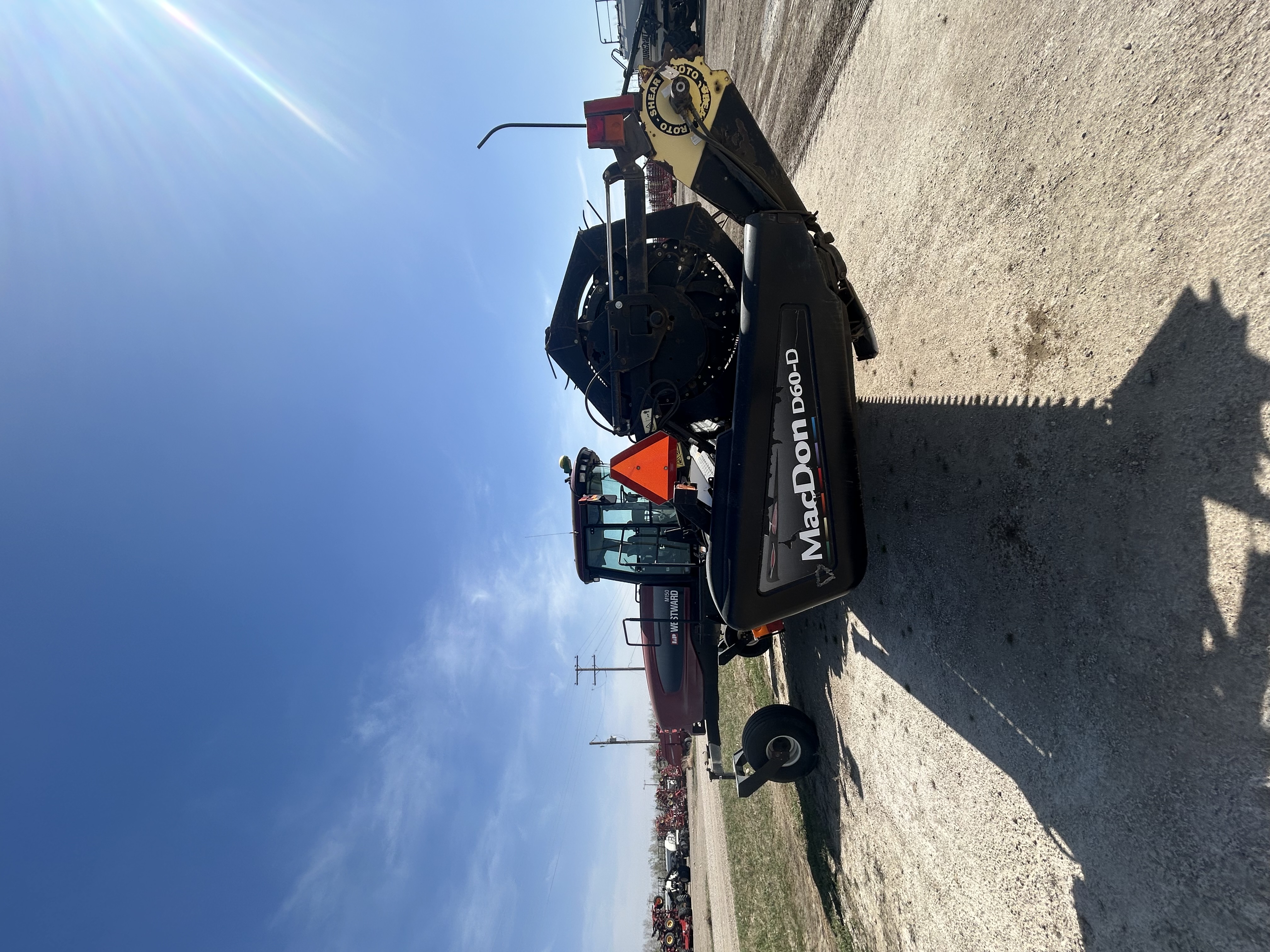 2010 MacDon M150 Windrower