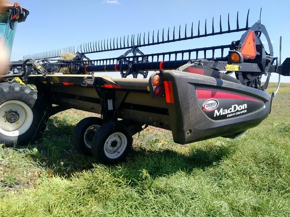 2013 MacDon M205 Windrower