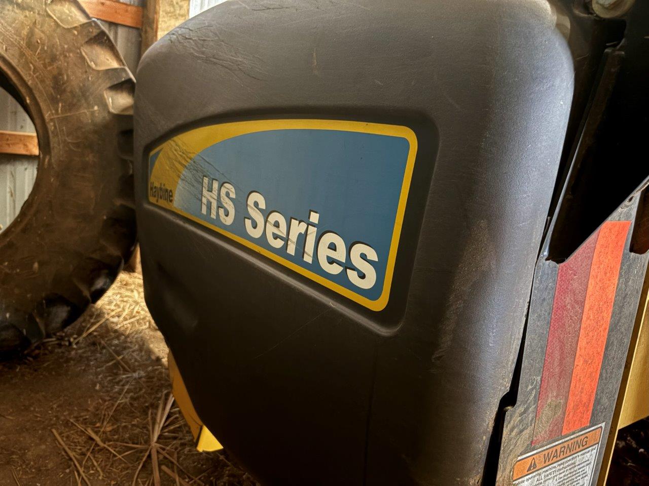 2009 New Holland H7150 - 18' Mower Conditioner