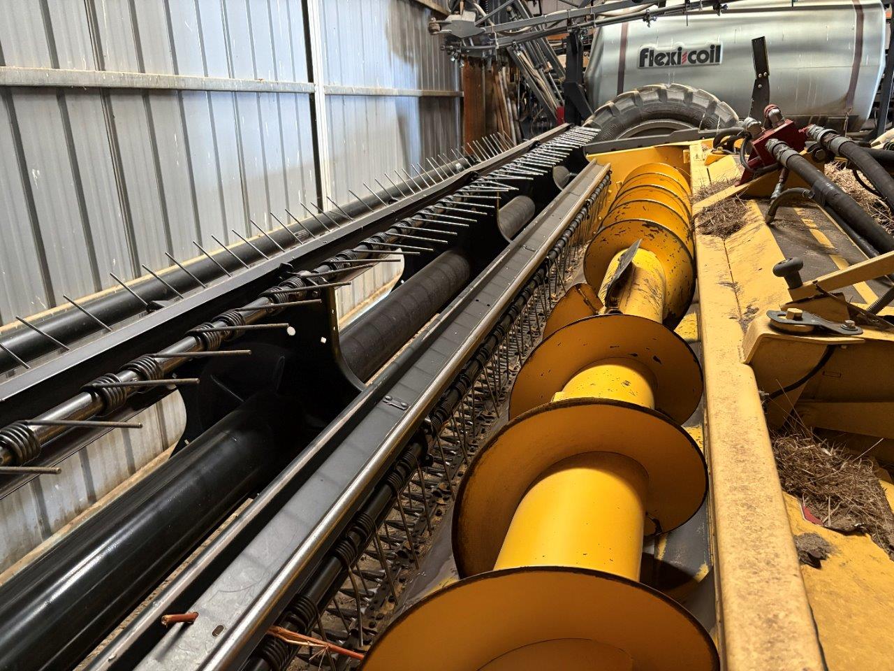 2009 New Holland H7150 - 18' Mower Conditioner