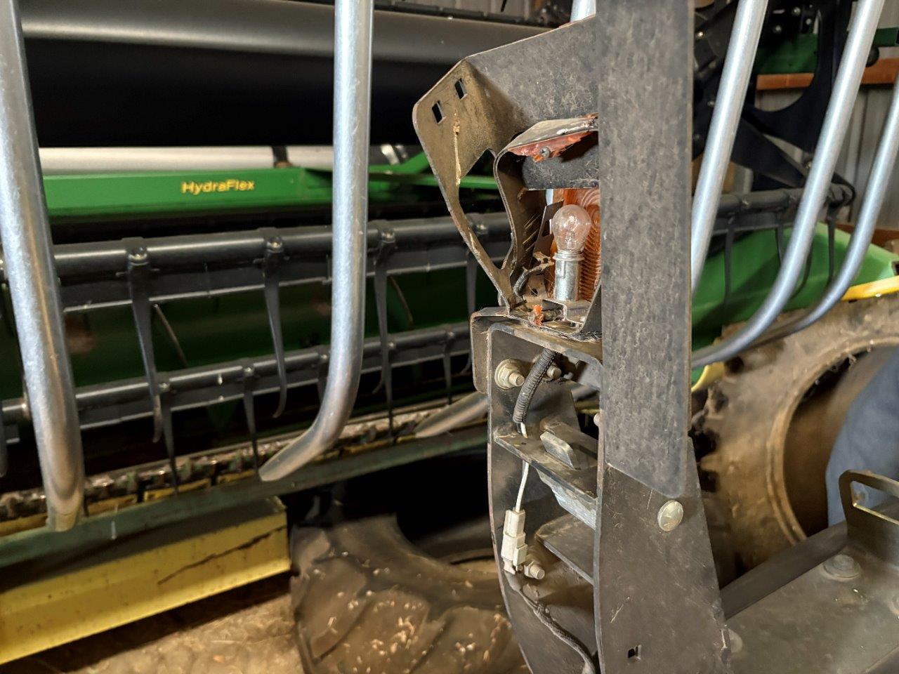 2009 New Holland H7150 - 18' Mower Conditioner