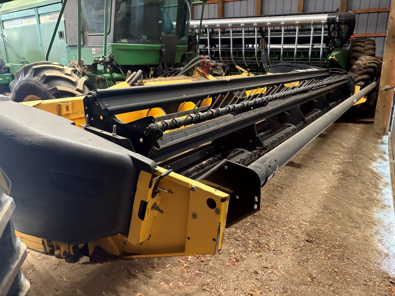 2009 New Holland H7150 - 18' Mower Conditioner