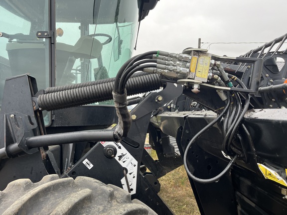 2009 MacDon M100 Windrower