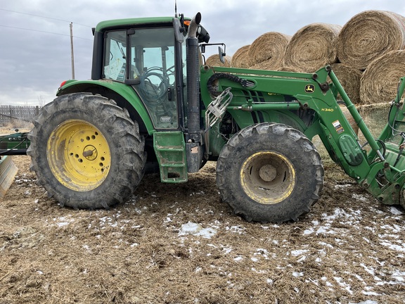 2014 John Deere 6115M Tractor