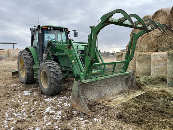 2014 John Deere 6115M Tractor