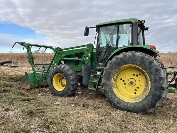 2014 John Deere 6115M Tractor