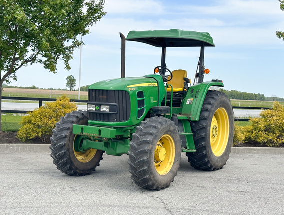 2012 John Deere 6115D Tractor