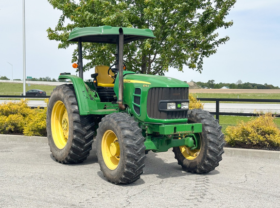 2012 John Deere 6115D Tractor