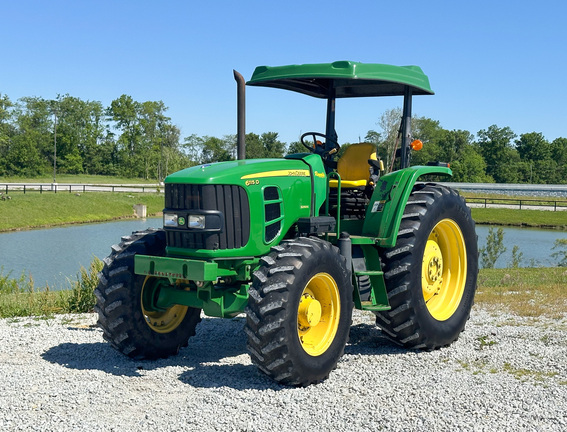 2012 John Deere 6115D Tractor