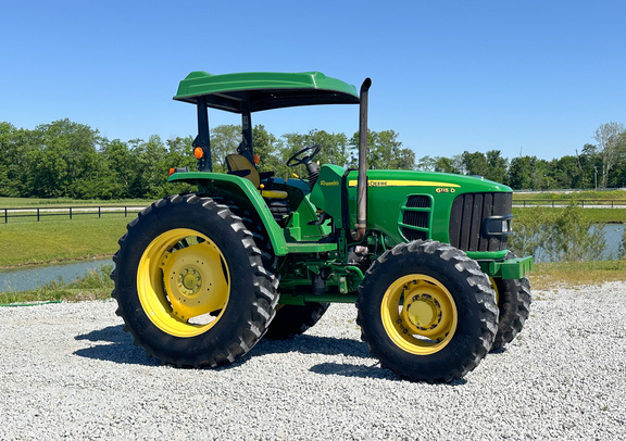 2012 John Deere 6115D Tractor