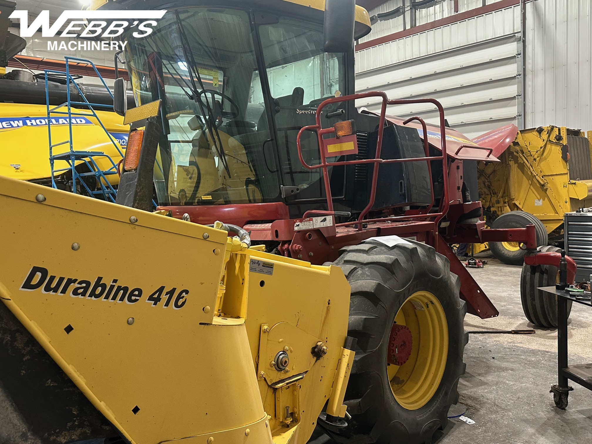 2011 New Holland H8060 Windrower