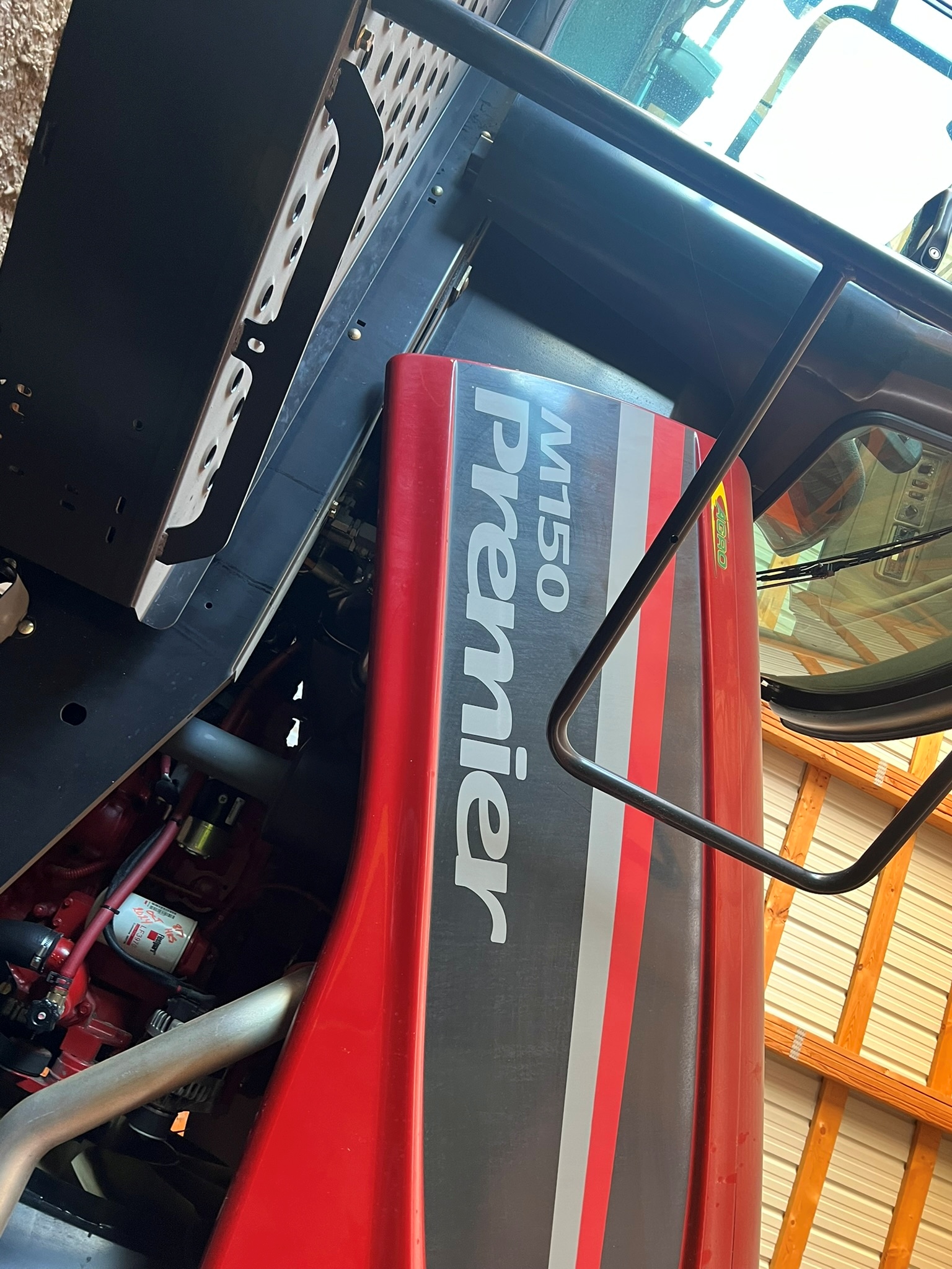 2011 MacDon M150 Swather