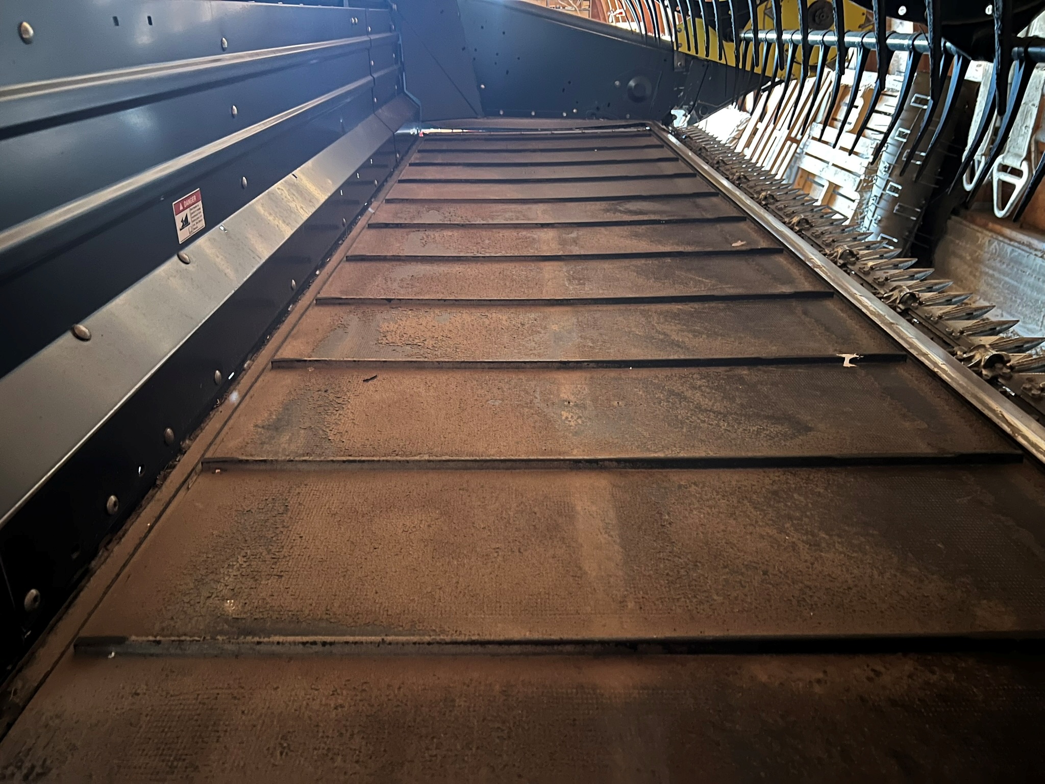 2011 MacDon M150 Swather