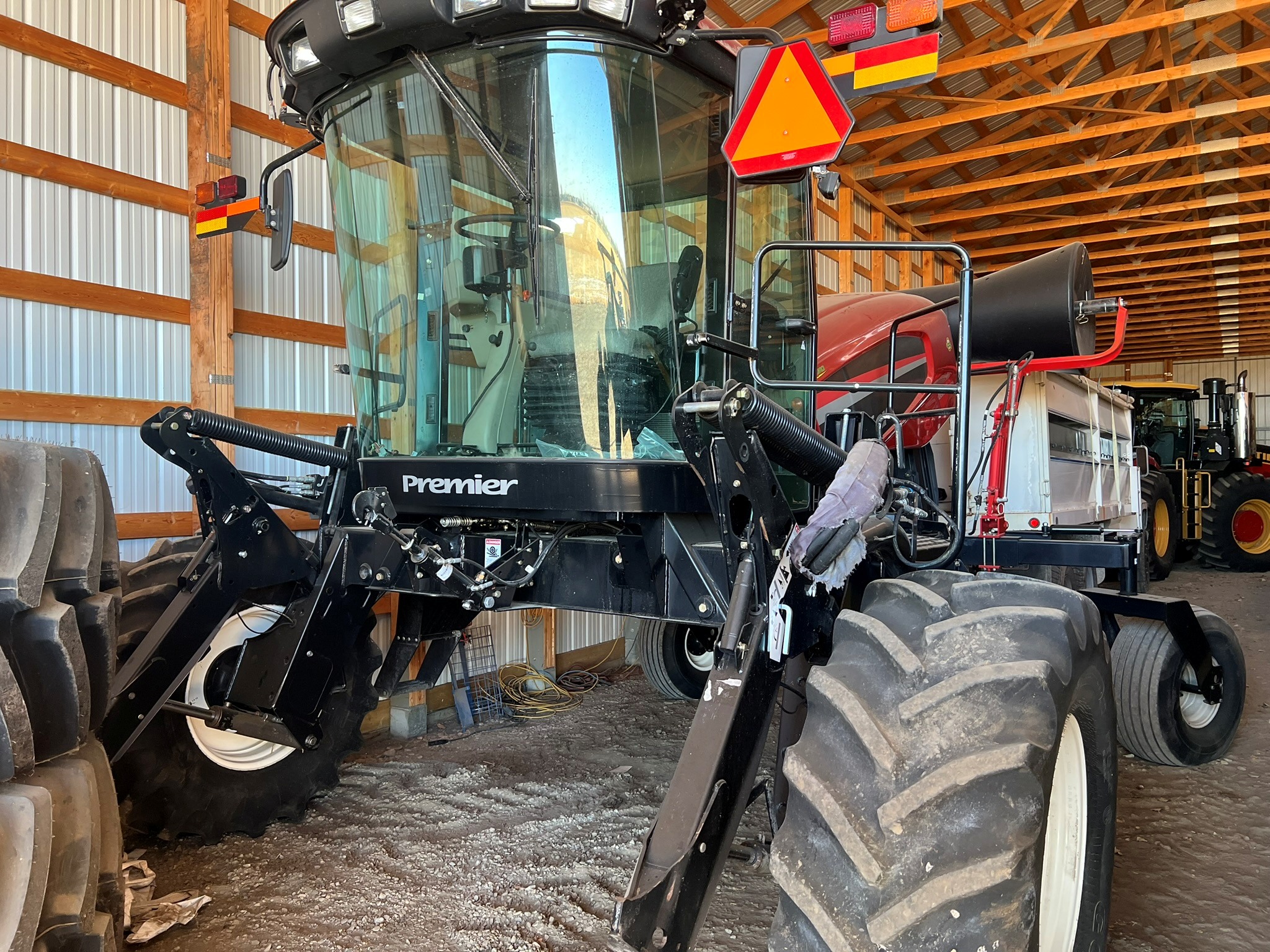 2011 MacDon M150 Swather