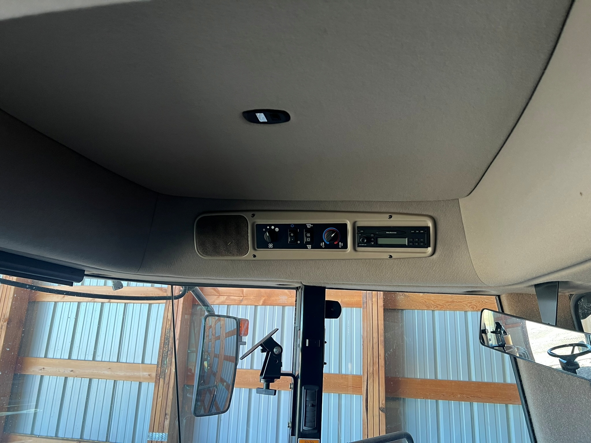 2011 MacDon M150 Swather