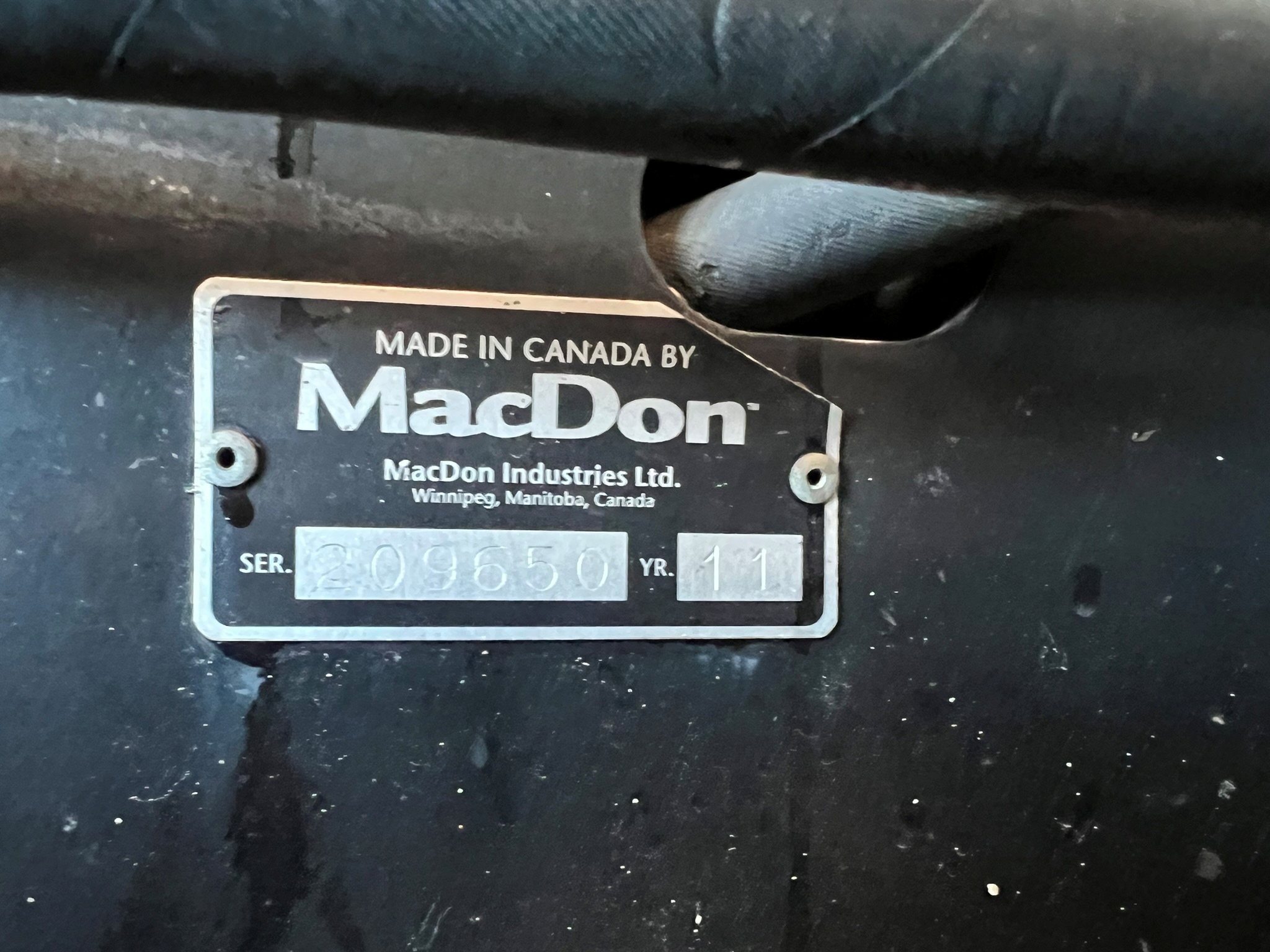 2011 MacDon M150 Swather