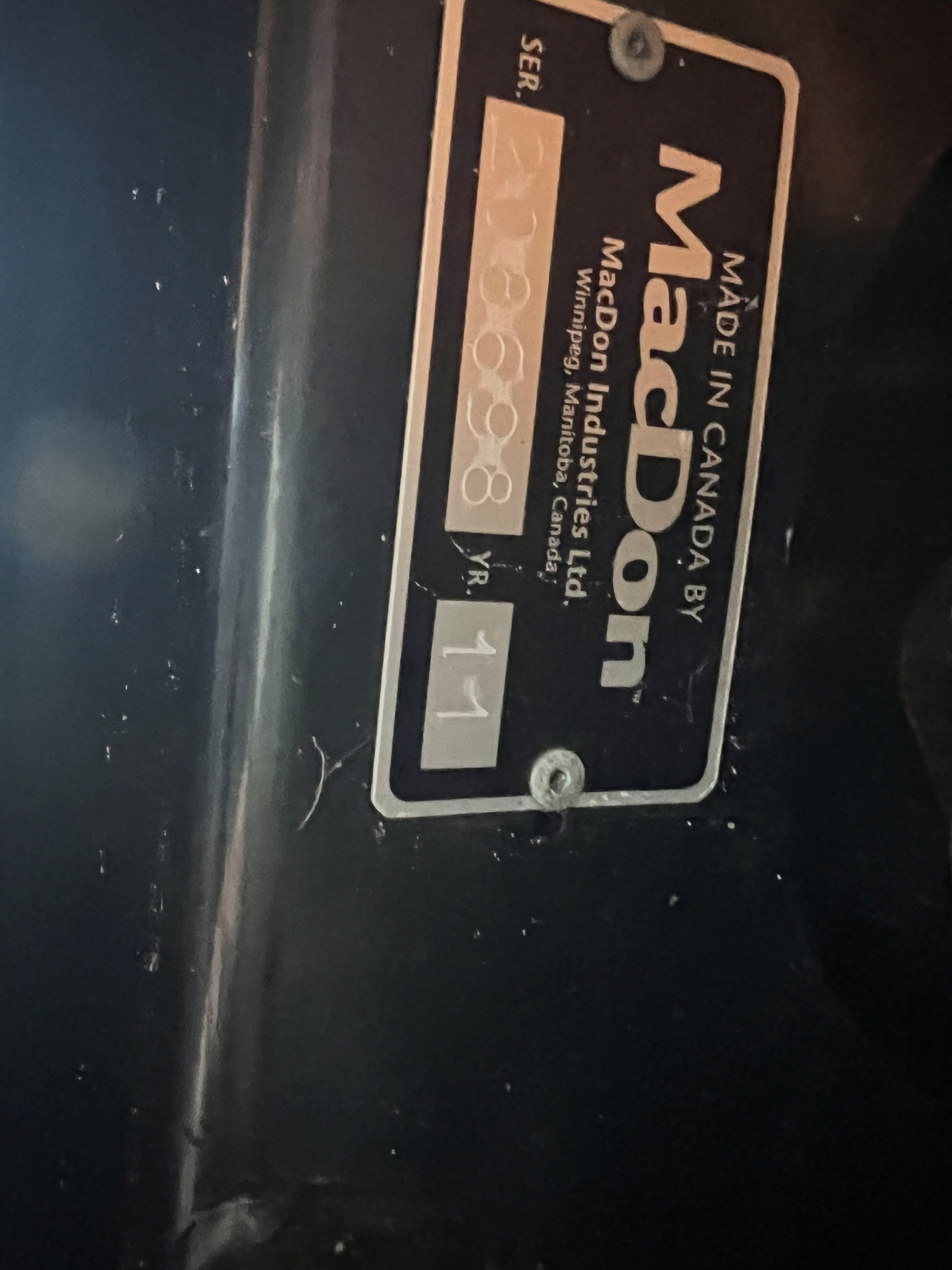 2011 MacDon M150 Swather