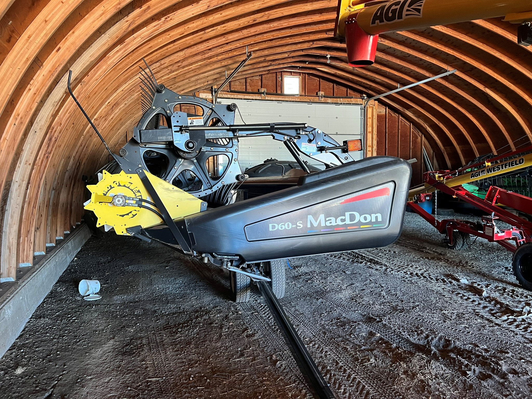 2011 MacDon M150 Swather