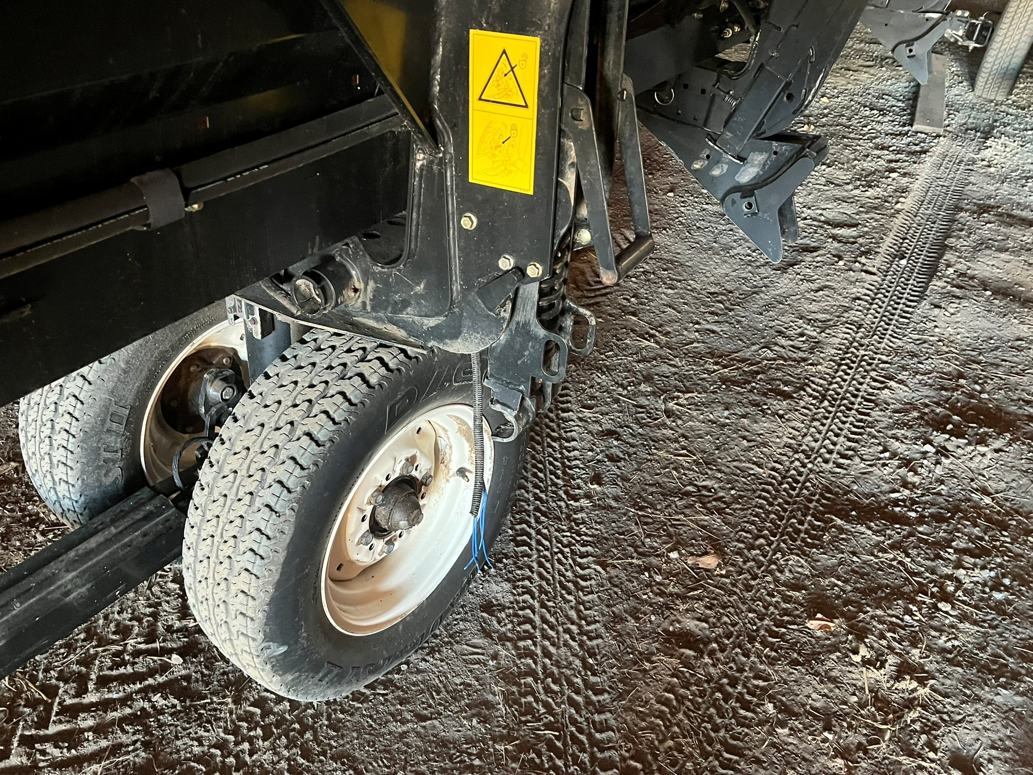 2011 MacDon M150 Swather