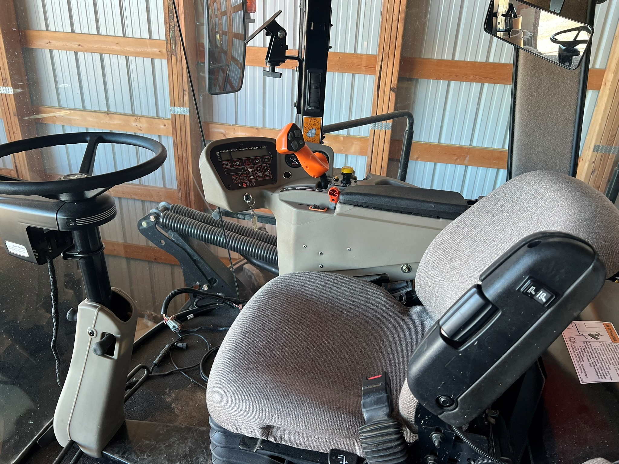 2011 MacDon M150 Swather