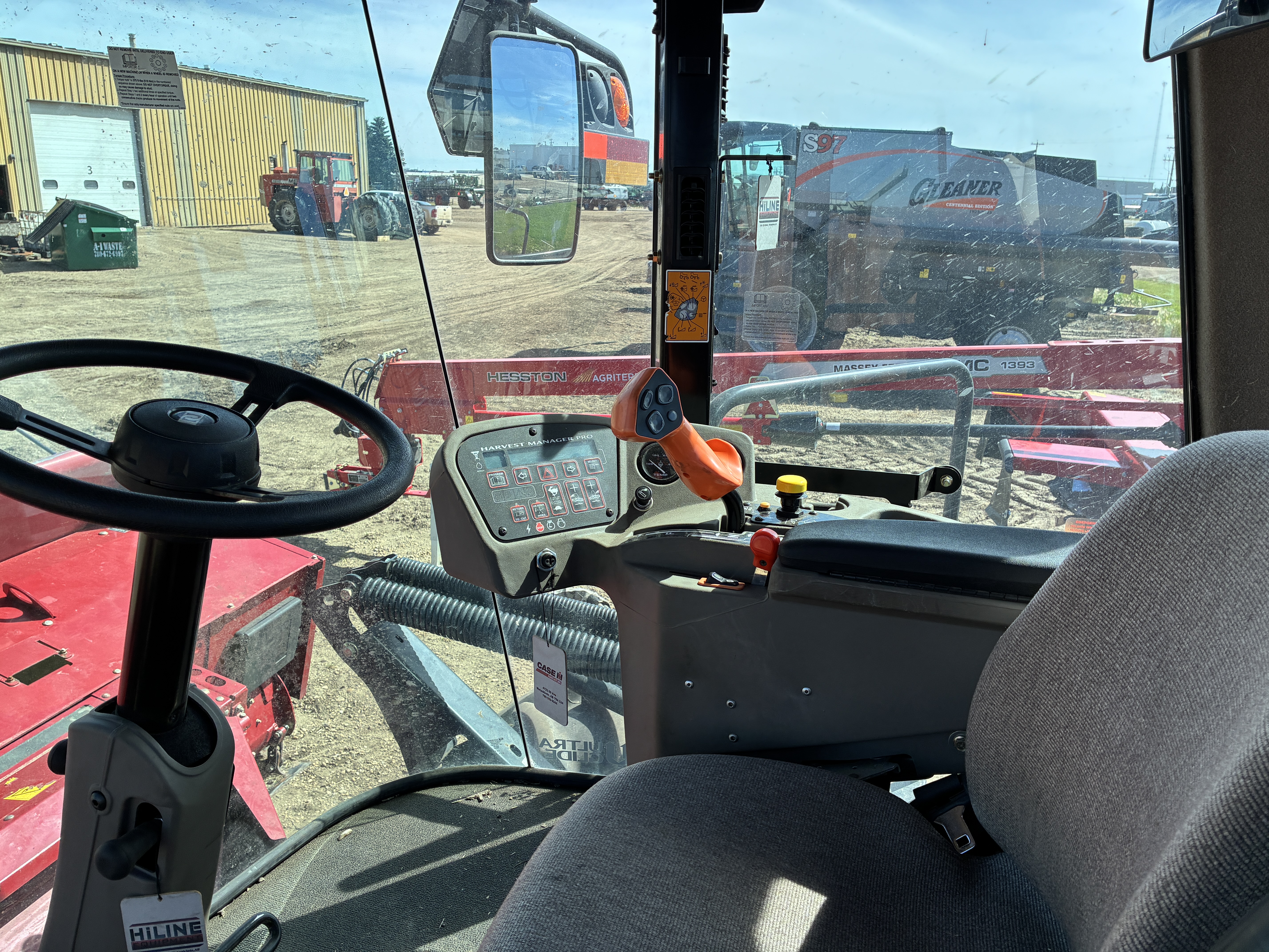2015 MacDon M205 Swather