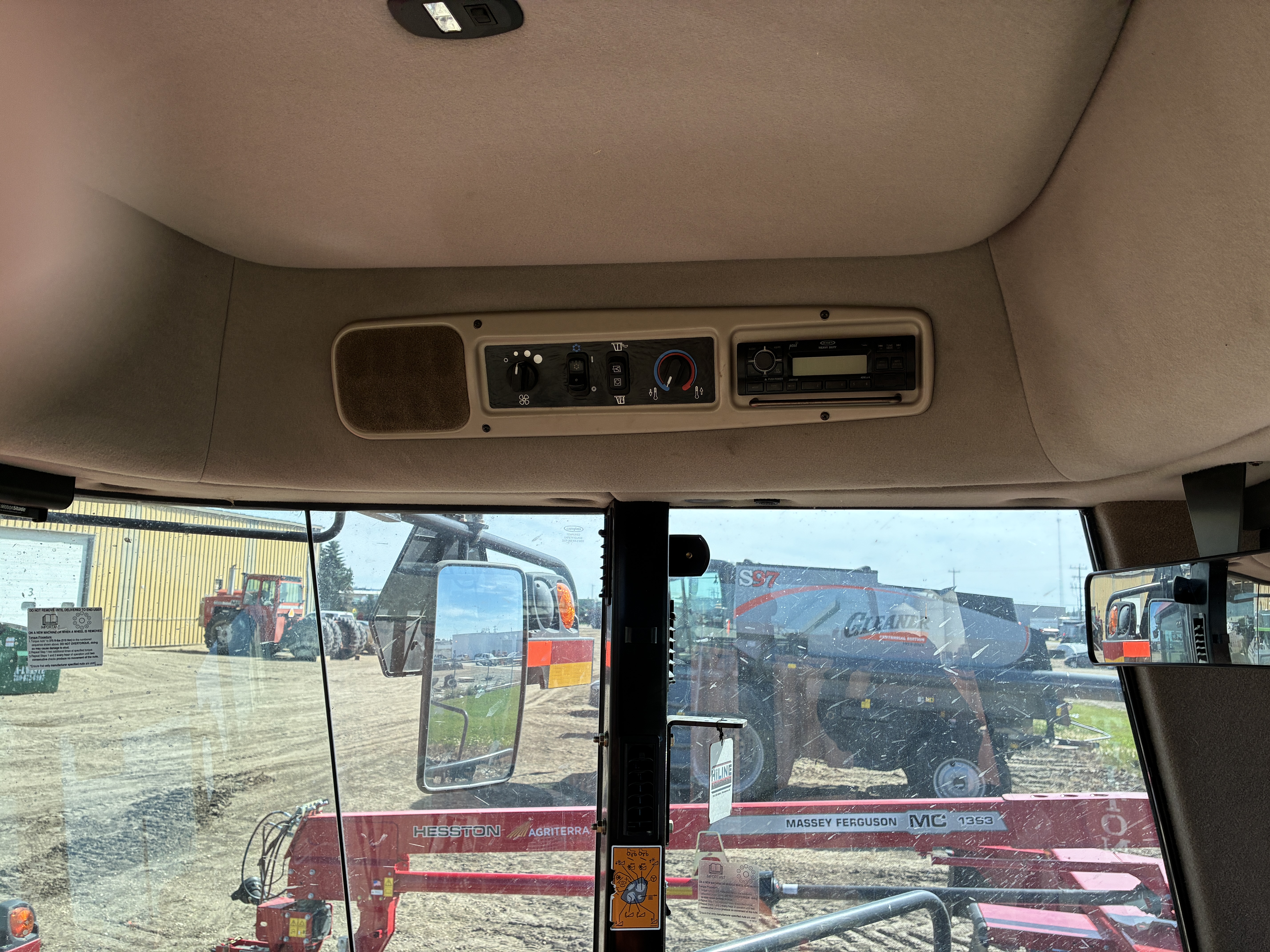 2015 MacDon M205 Swather