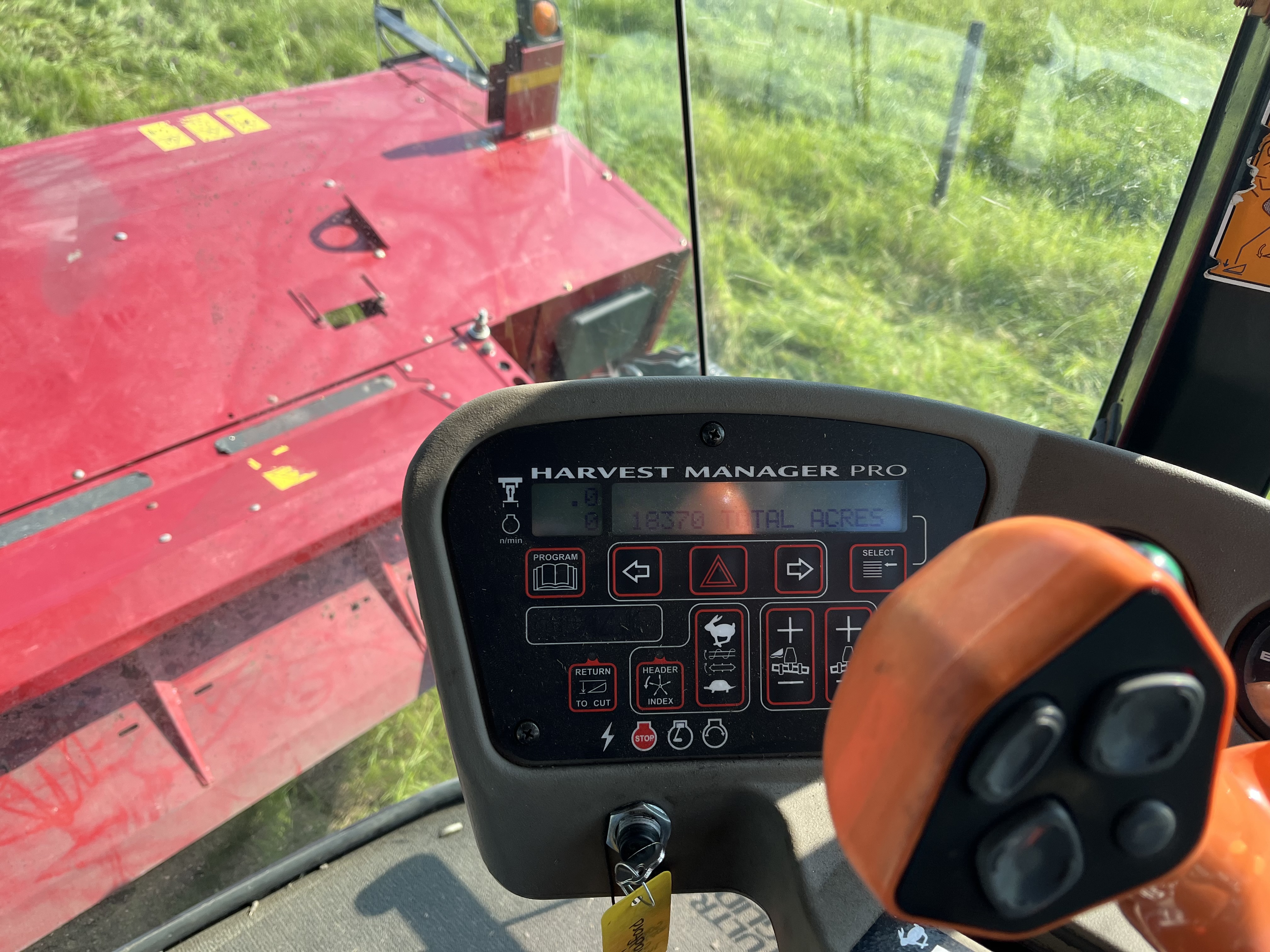 2015 MacDon M205 Swather