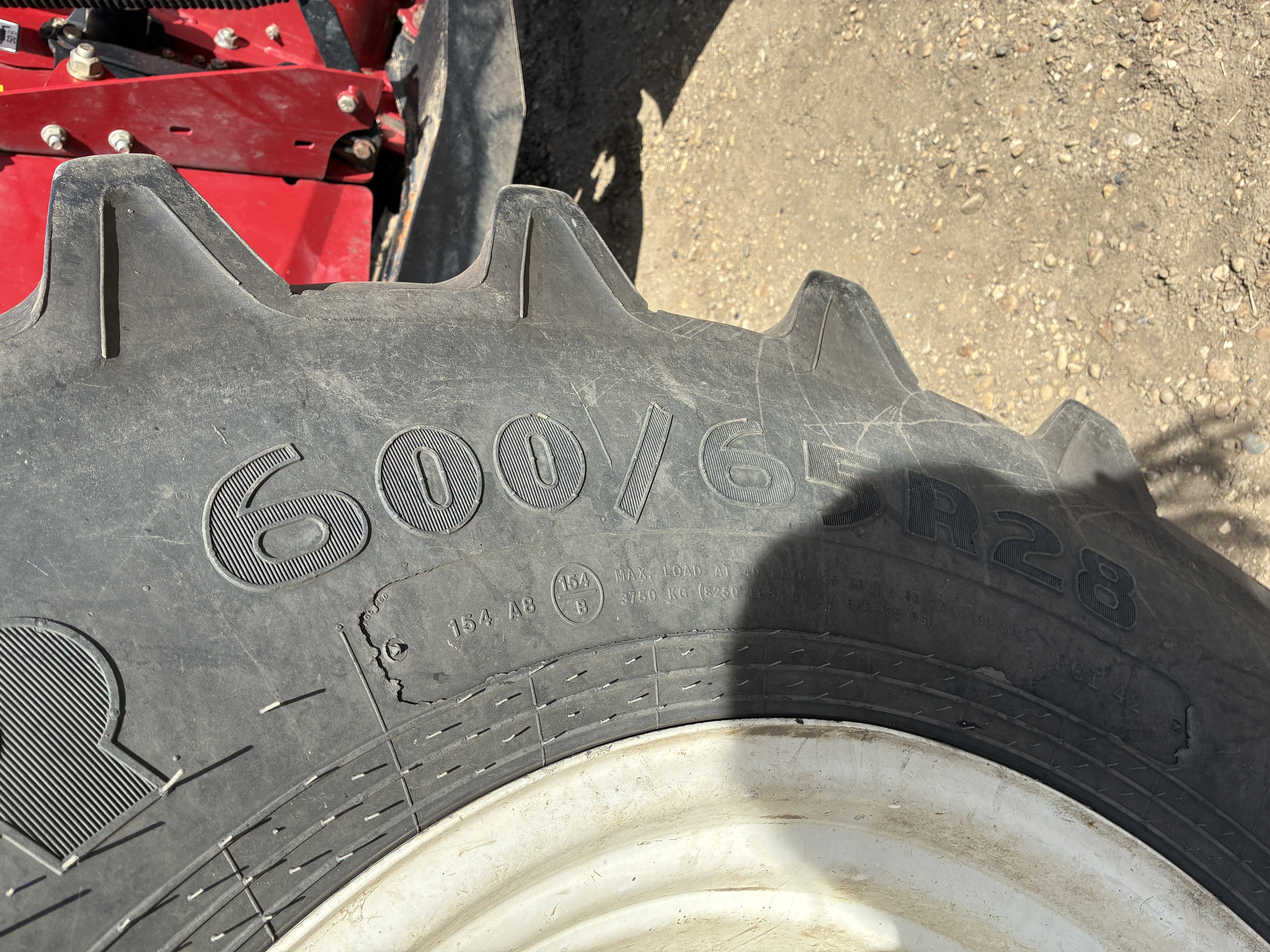 2015 MacDon M205 Swather