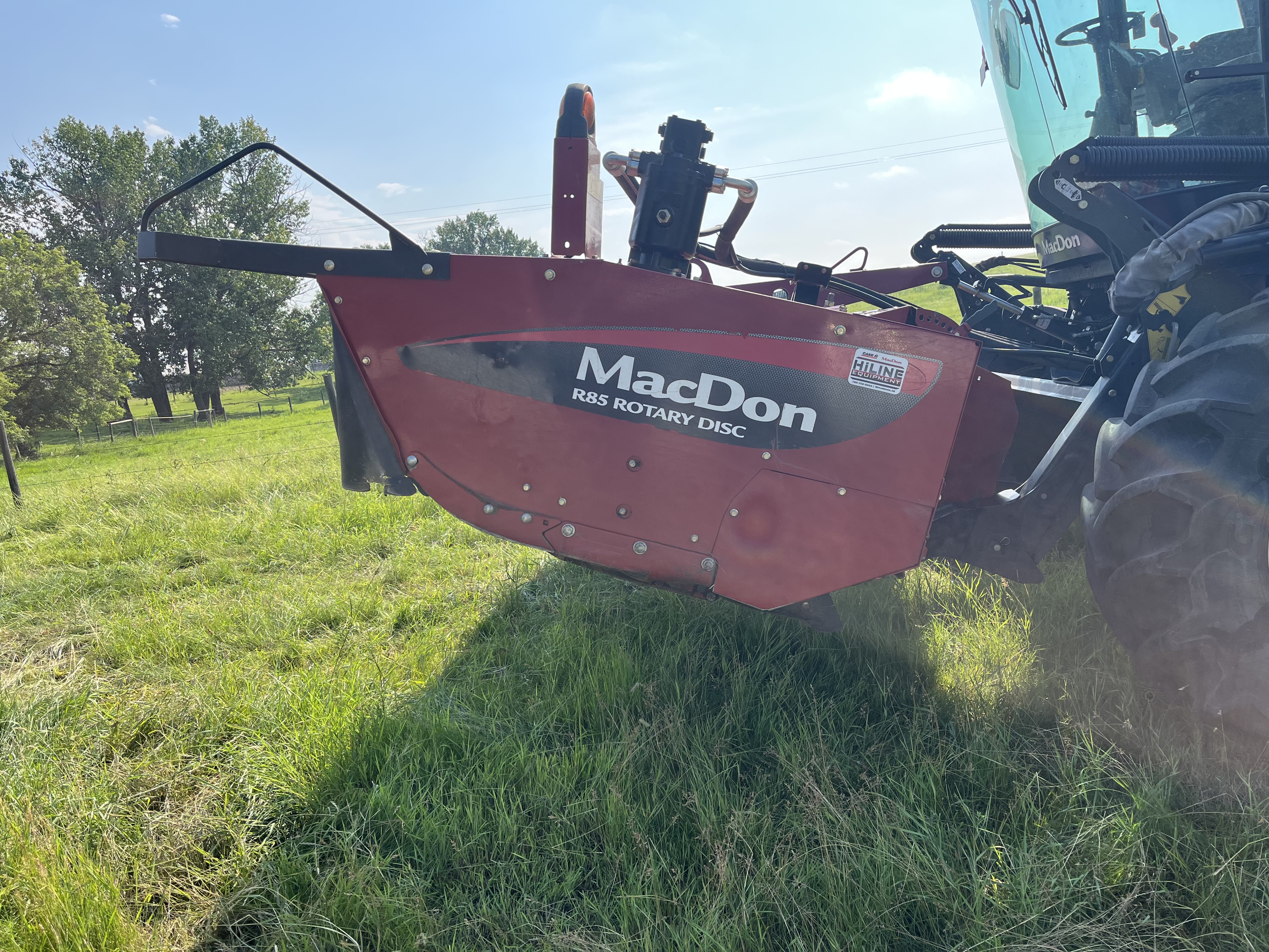 2015 MacDon M205 Swather