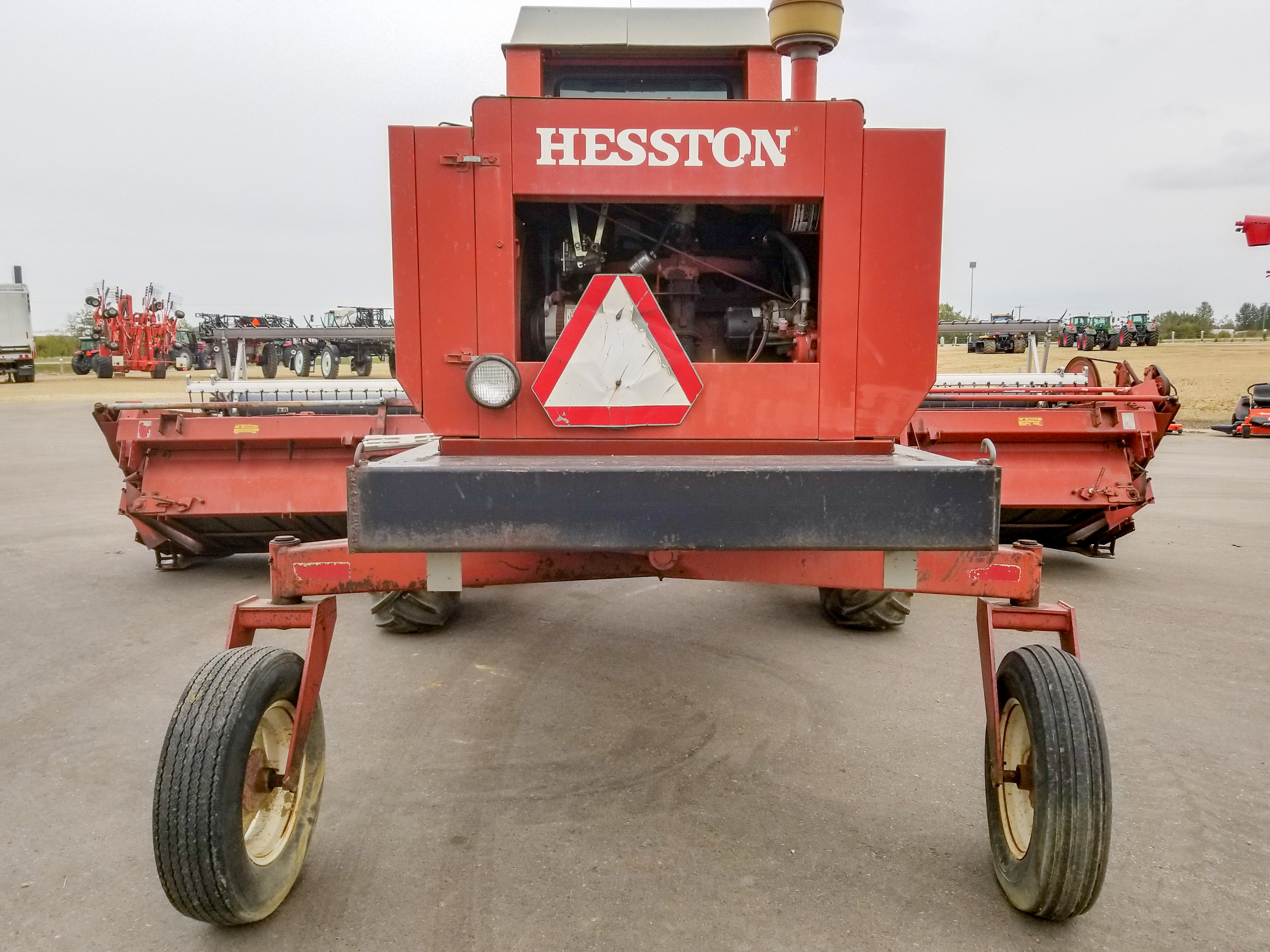 1985 Hesston 6455 Swather for sale in Lacombe, AB | IronSearch