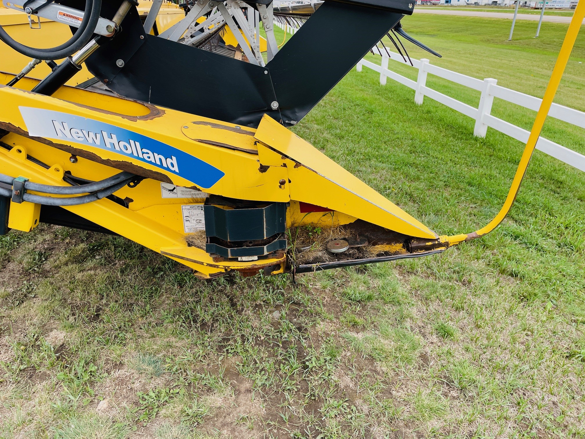 2013 New Holland H8040 Swather