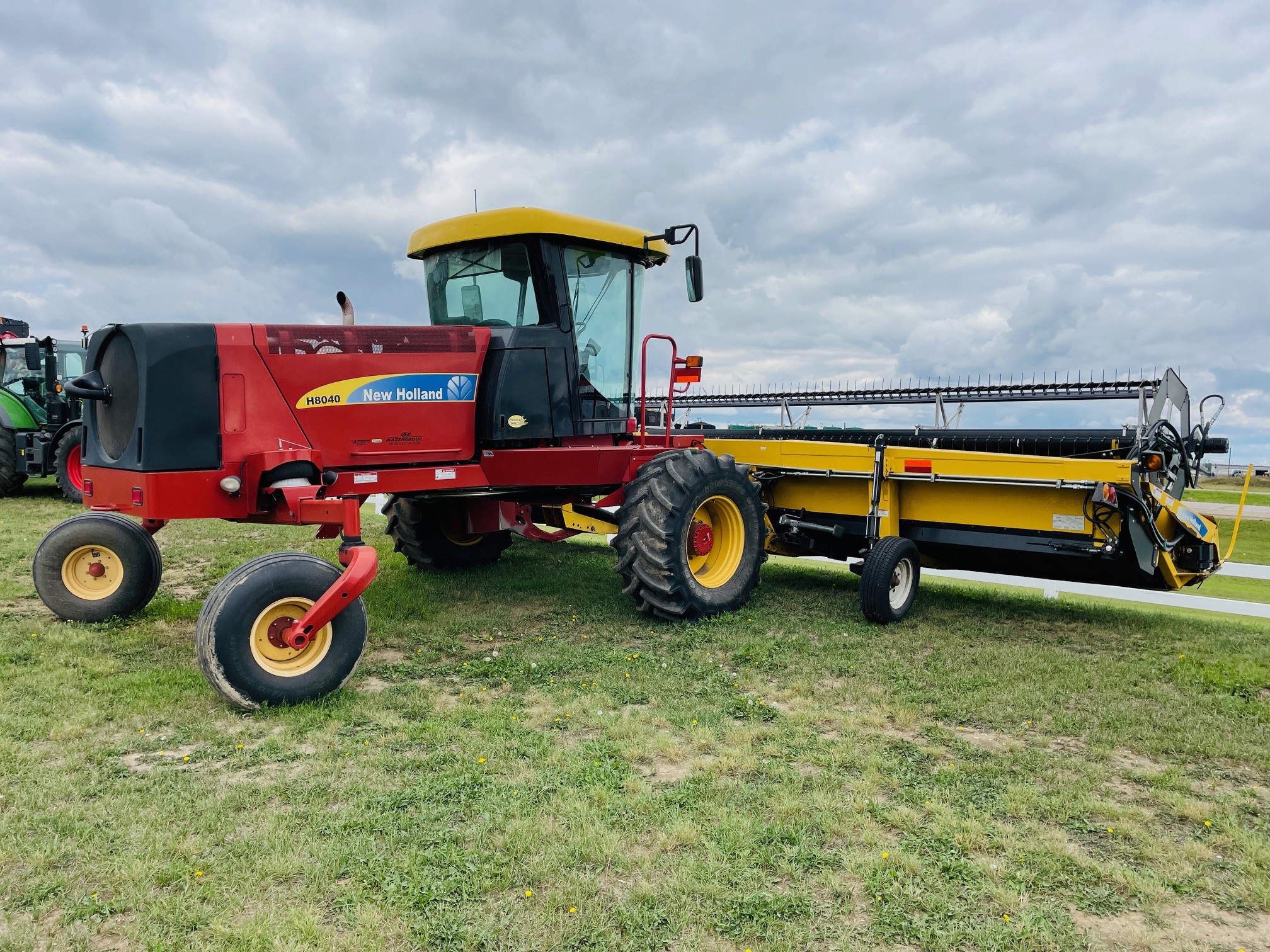 2013 New Holland H8040 Swather