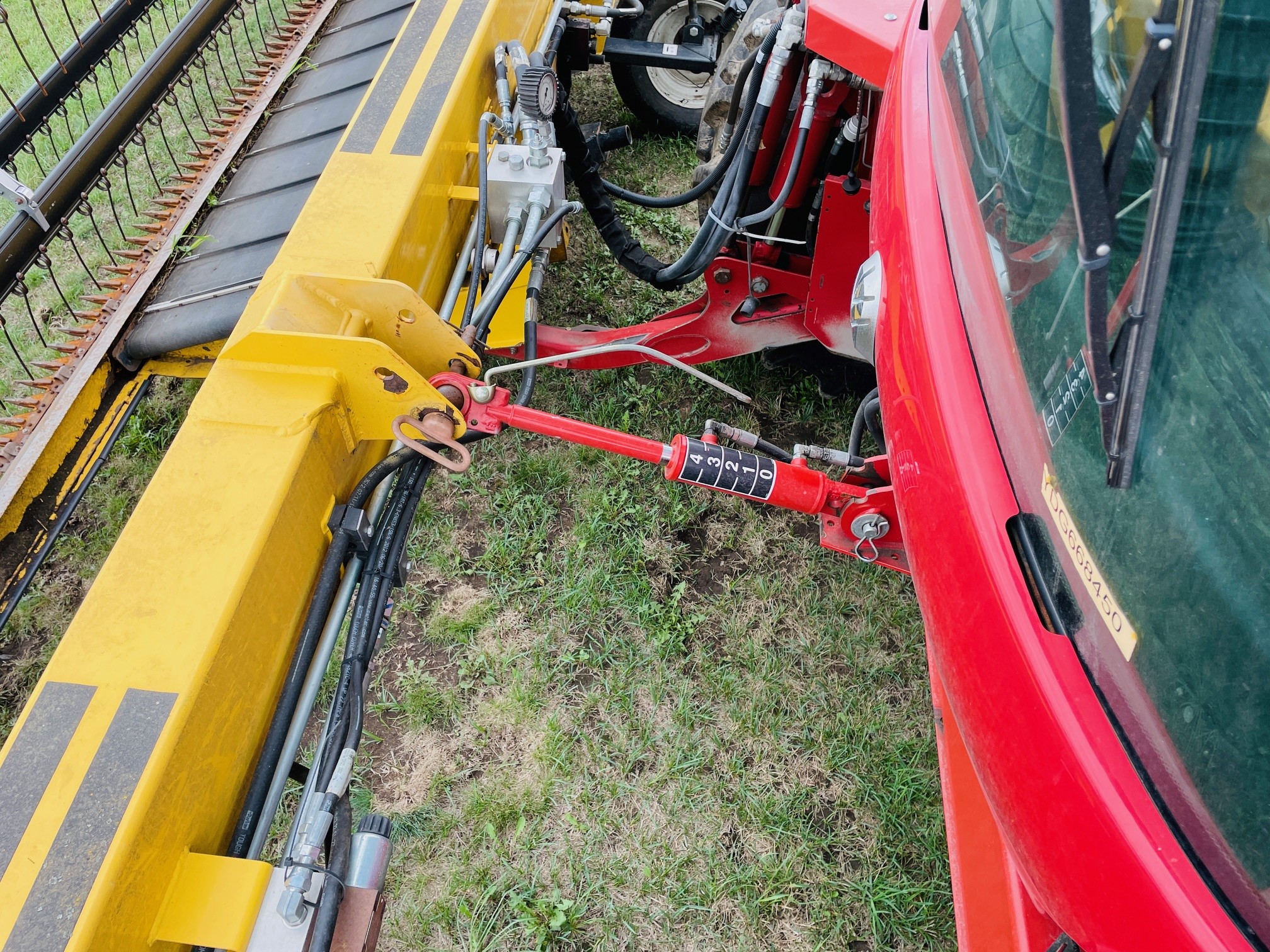 2013 New Holland H8040 Swather