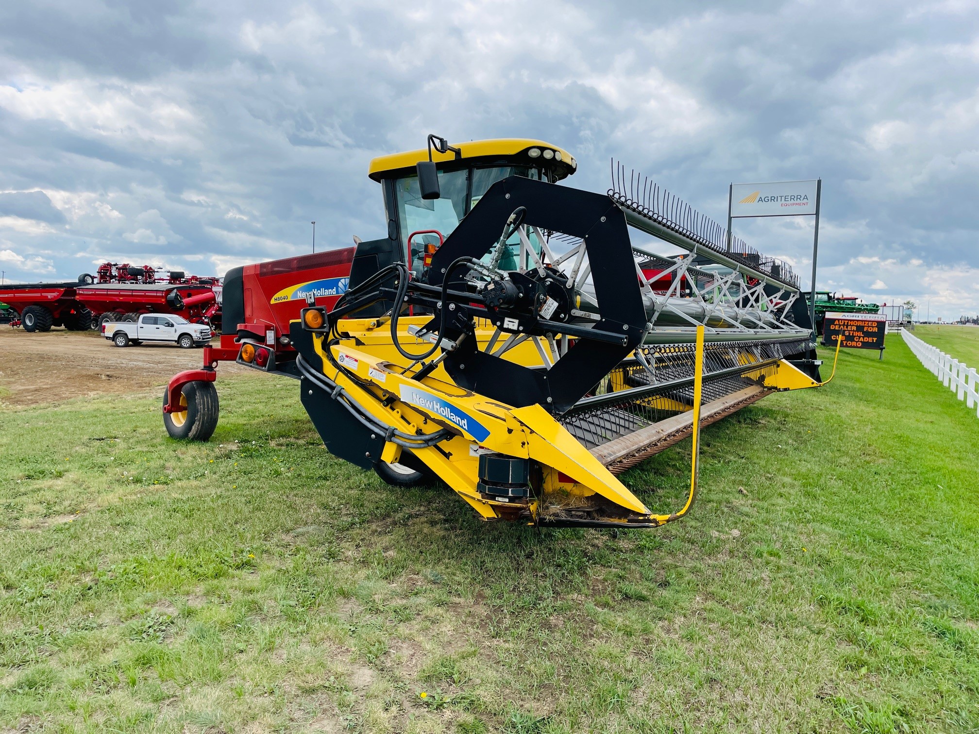 2013 New Holland H8040 Swather