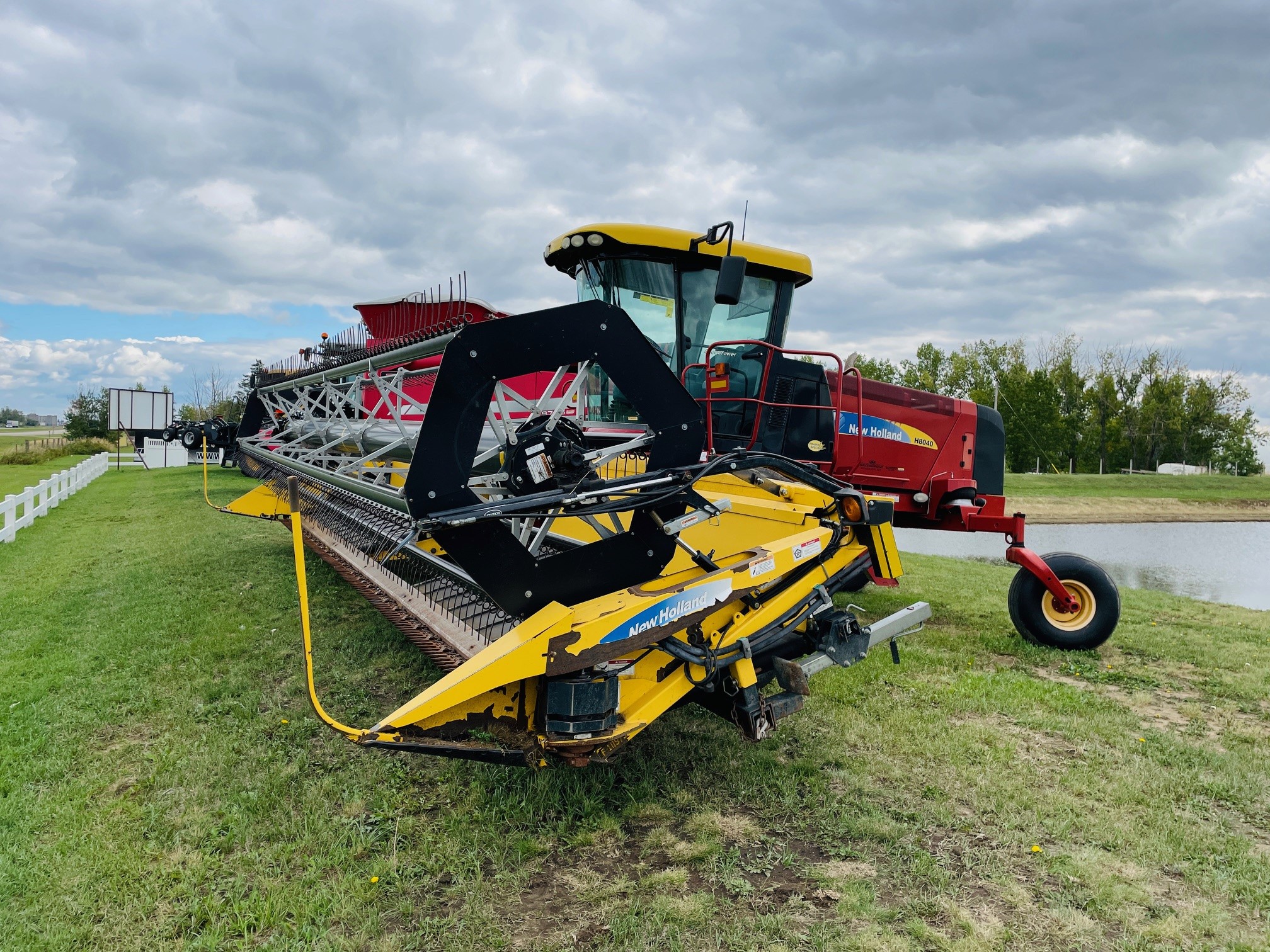 2013 New Holland H8040 Swather