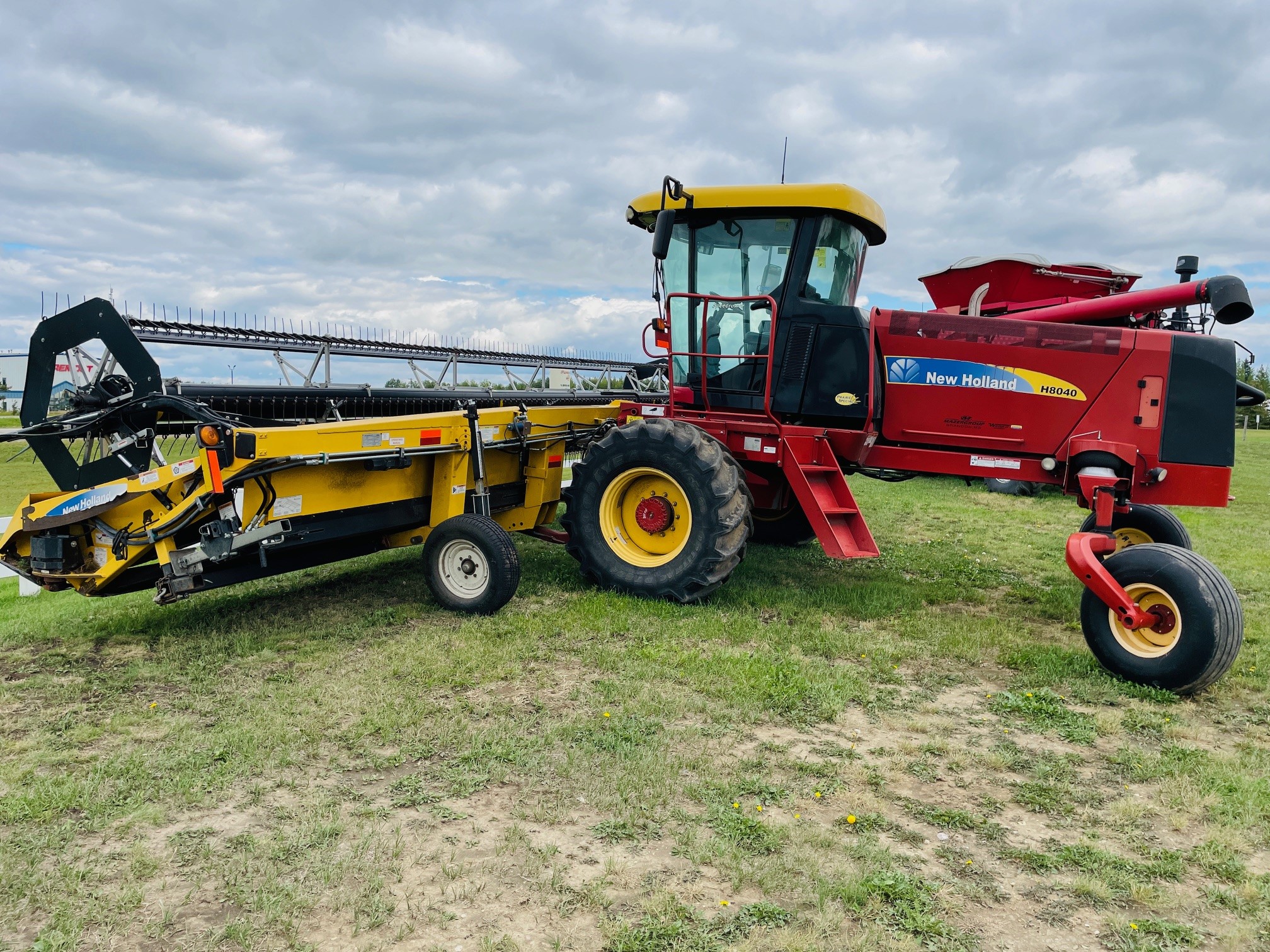 2013 New Holland H8040 Swather