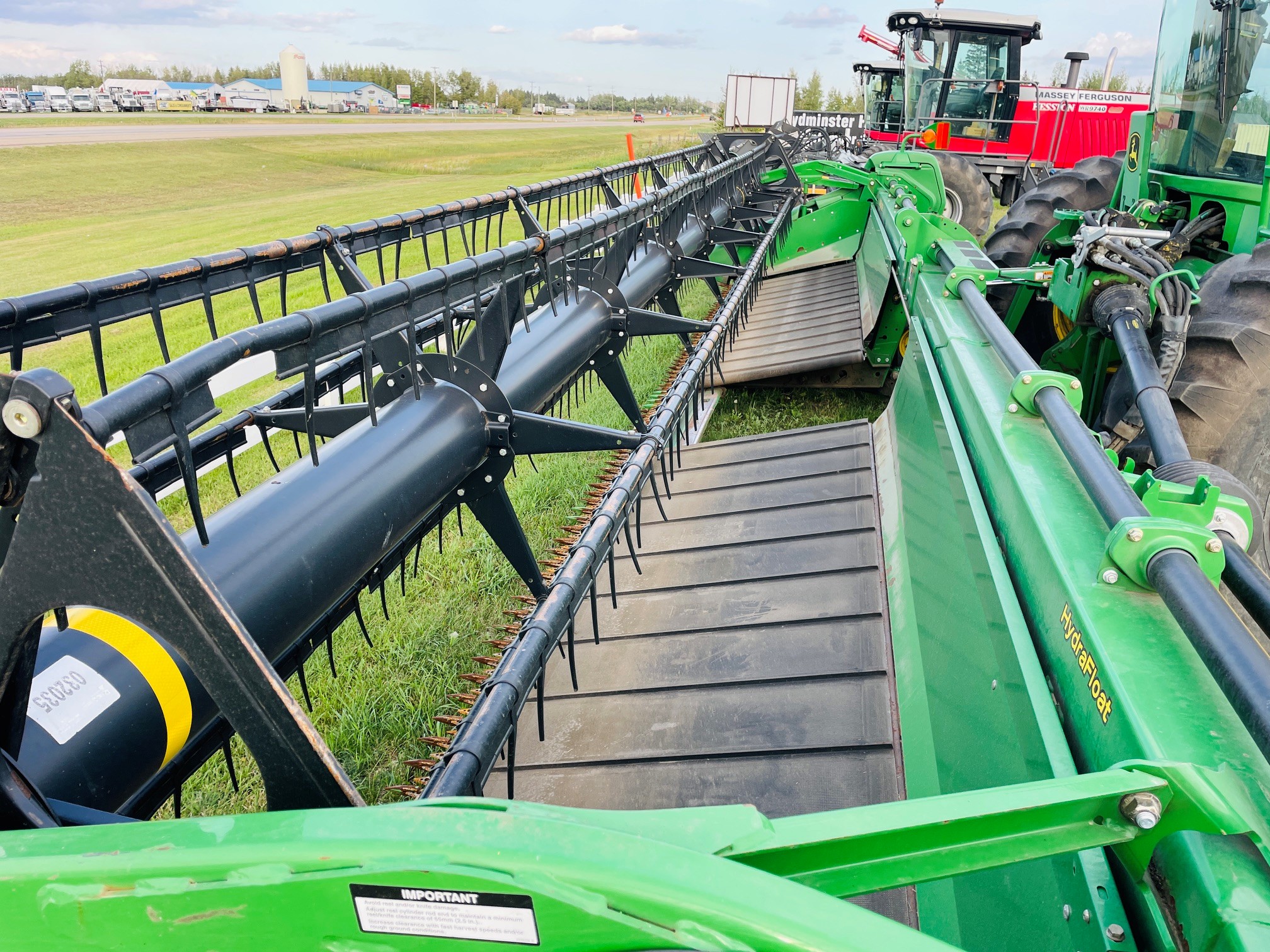 2012 John Deere D450 Swather
