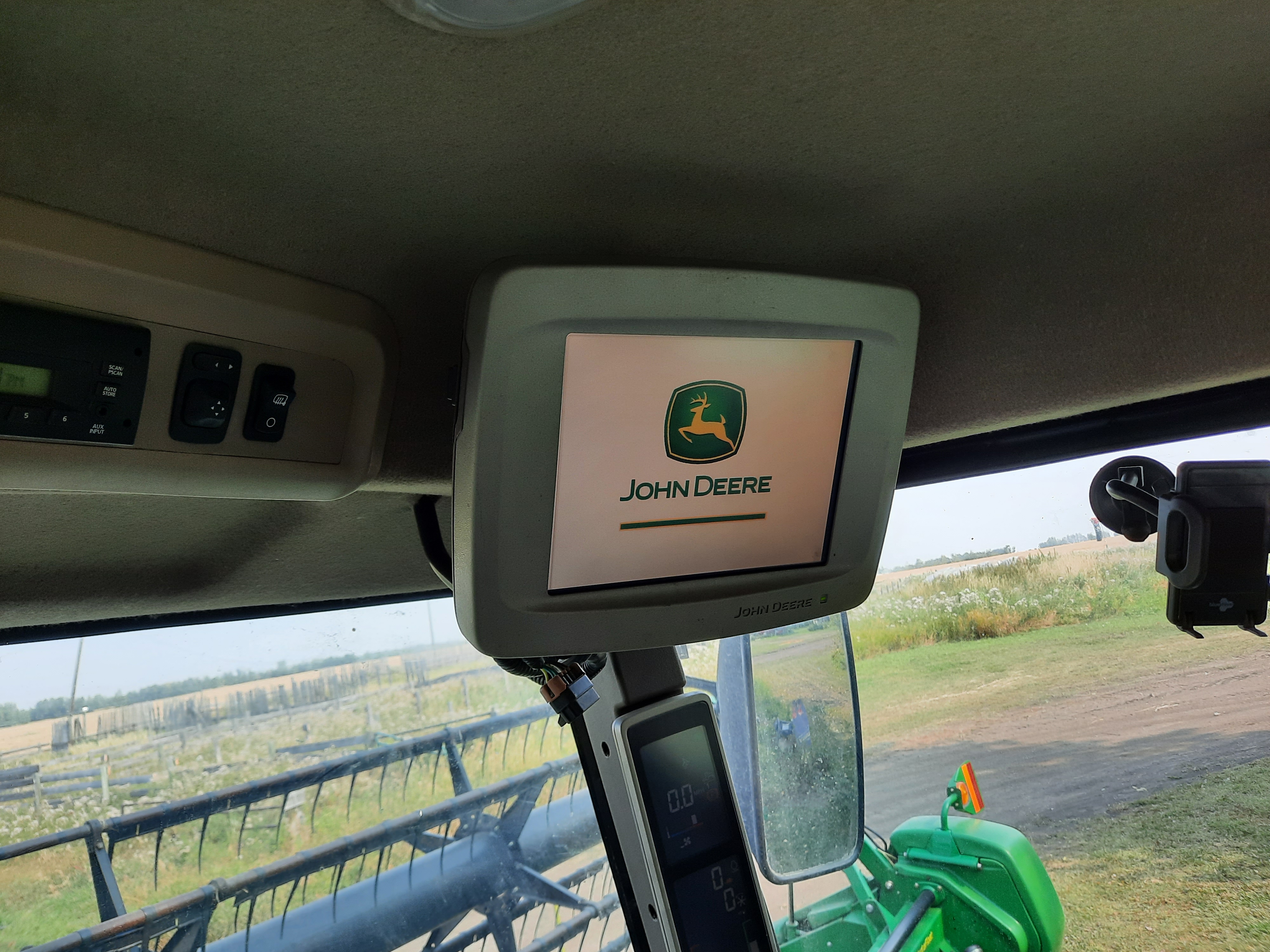 2011 John Deere D450 Swather