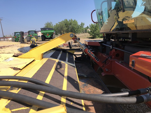 2013 New Holland H8060 Windrower