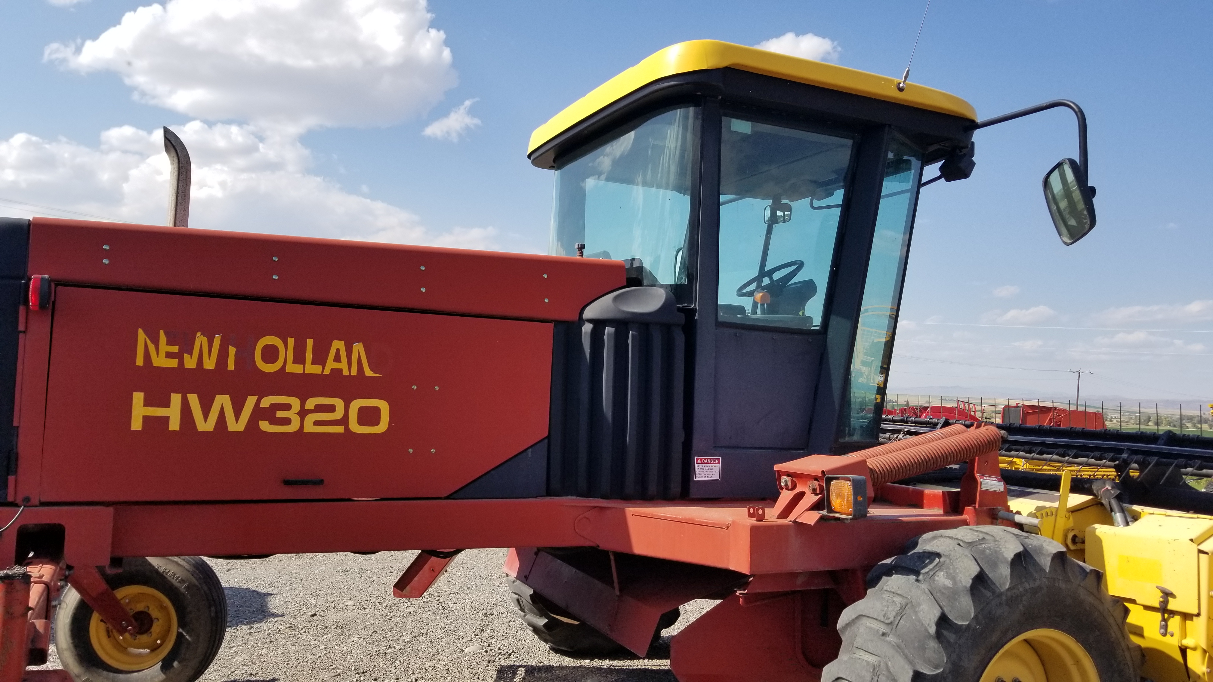 2001 New Holland HW320 Windrower